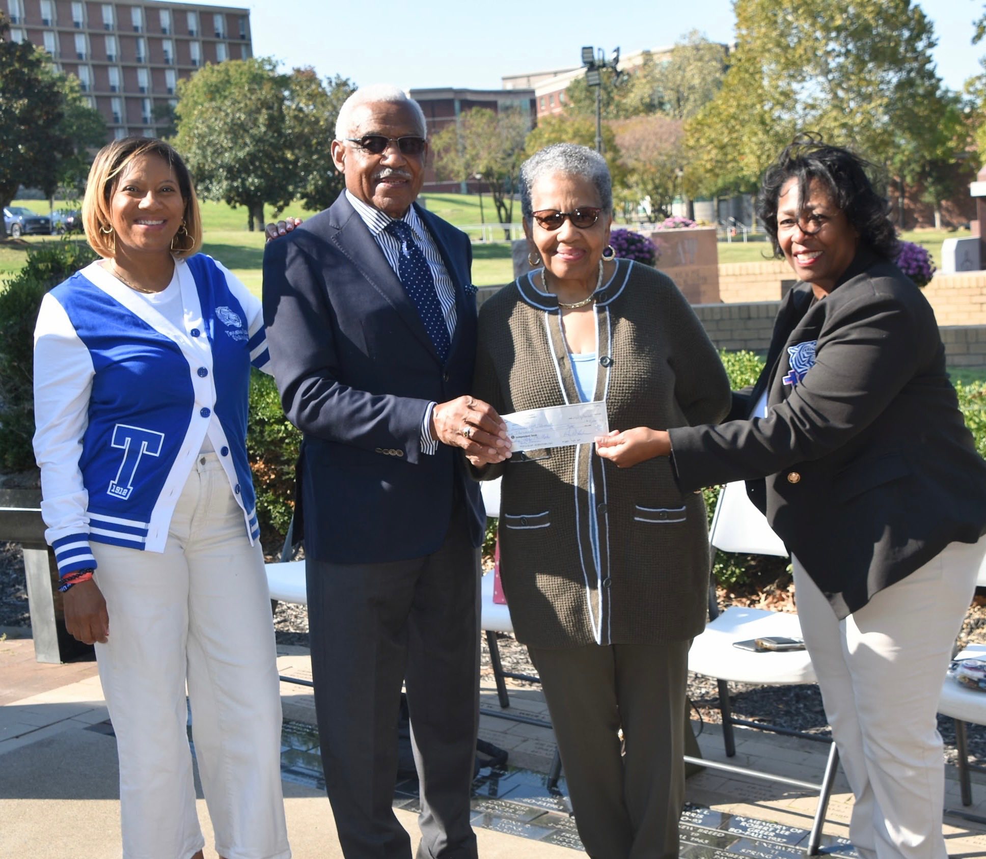 Tennessee - Mr. AC and Attorney Ruby Roy Wharton presents a check to ...
