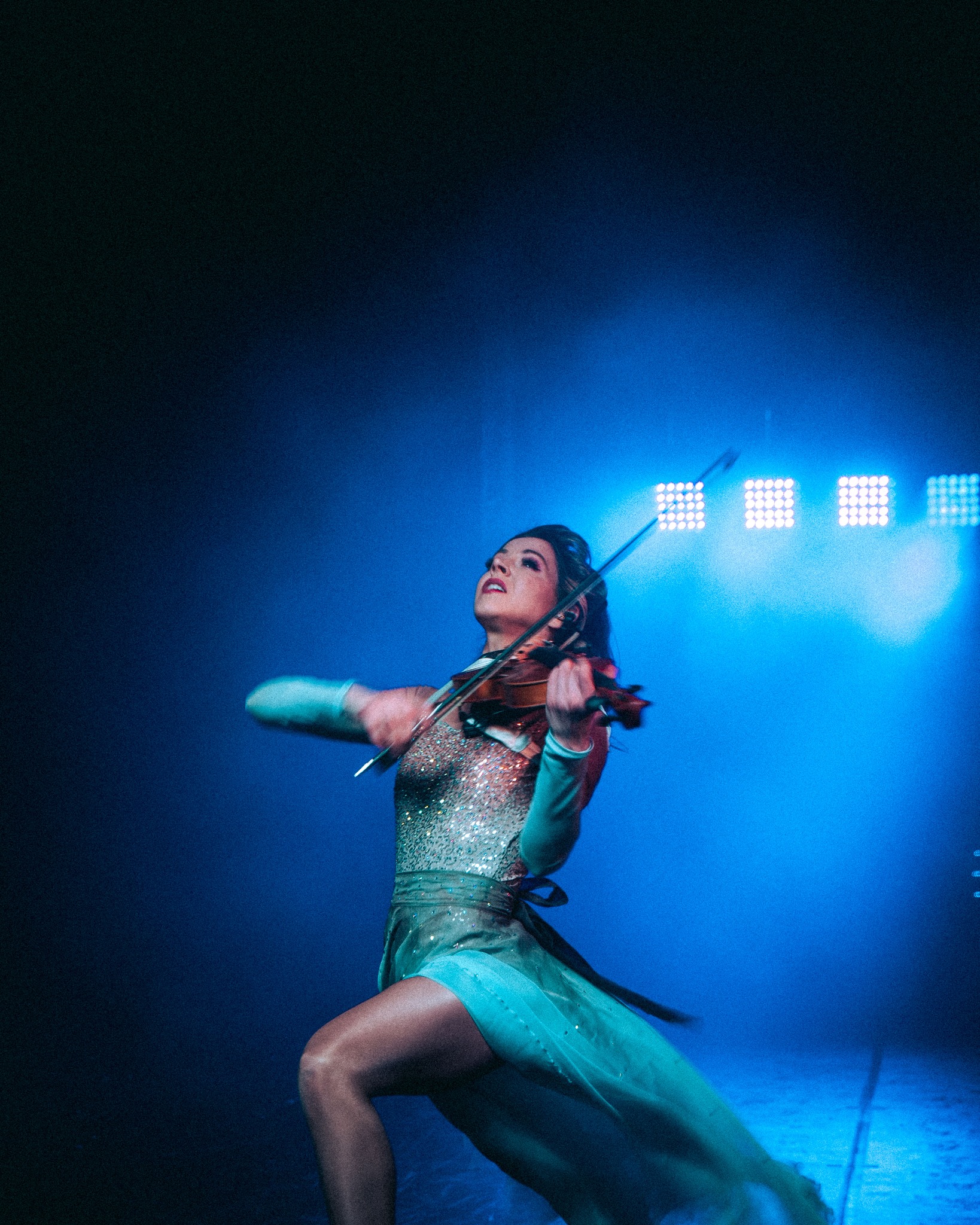 lindsey stirling blue dress A performance transcends the average concert. It is a full-blown production that needs to be experienced live.