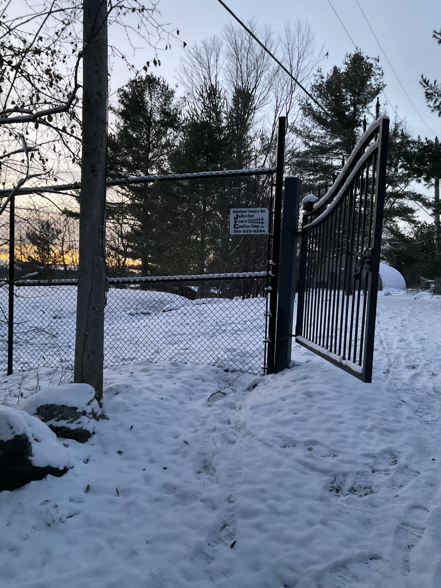 8 ft high black chain link... - Johnston Fence Contracting | Facebook