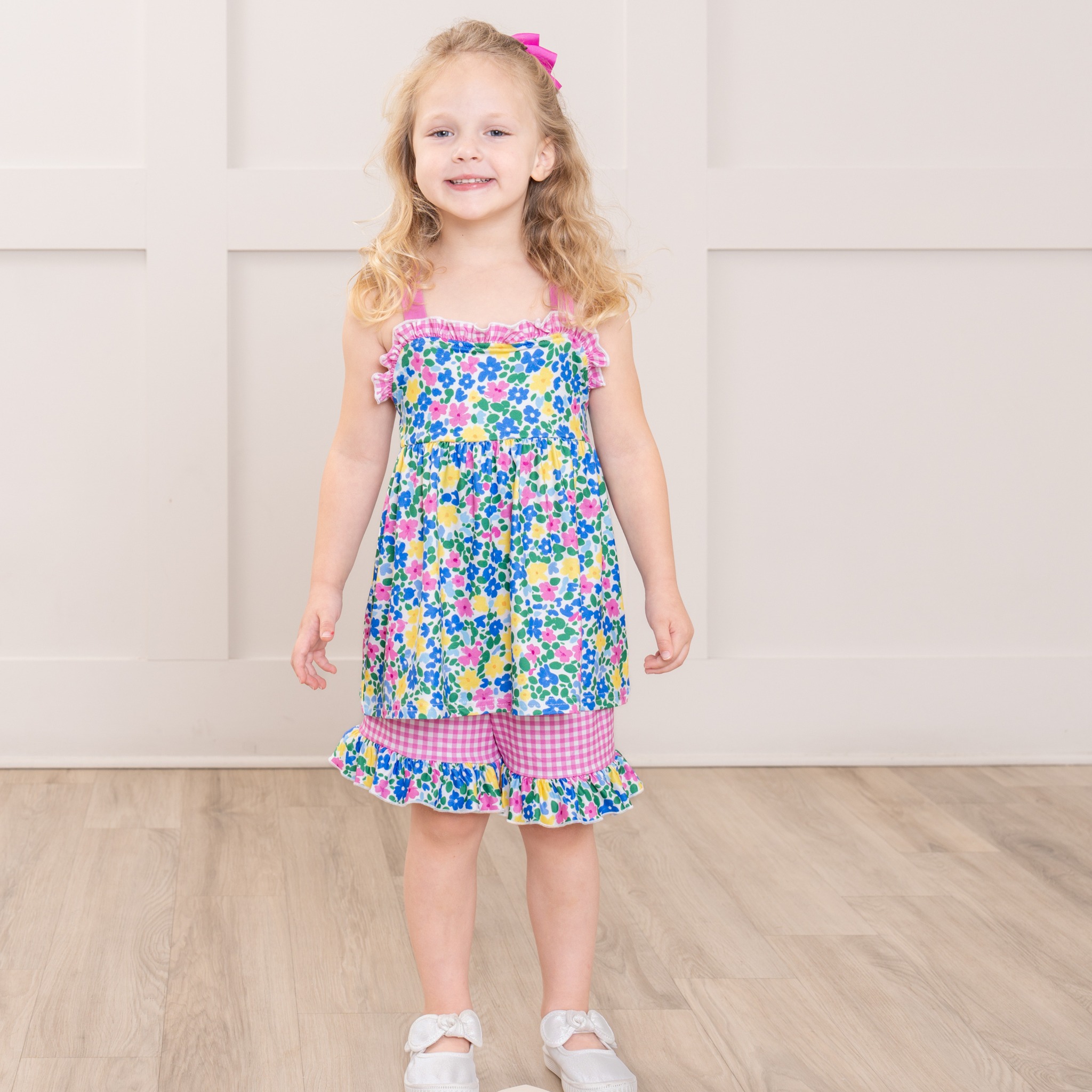 Fresh blooms and ruffle details we can