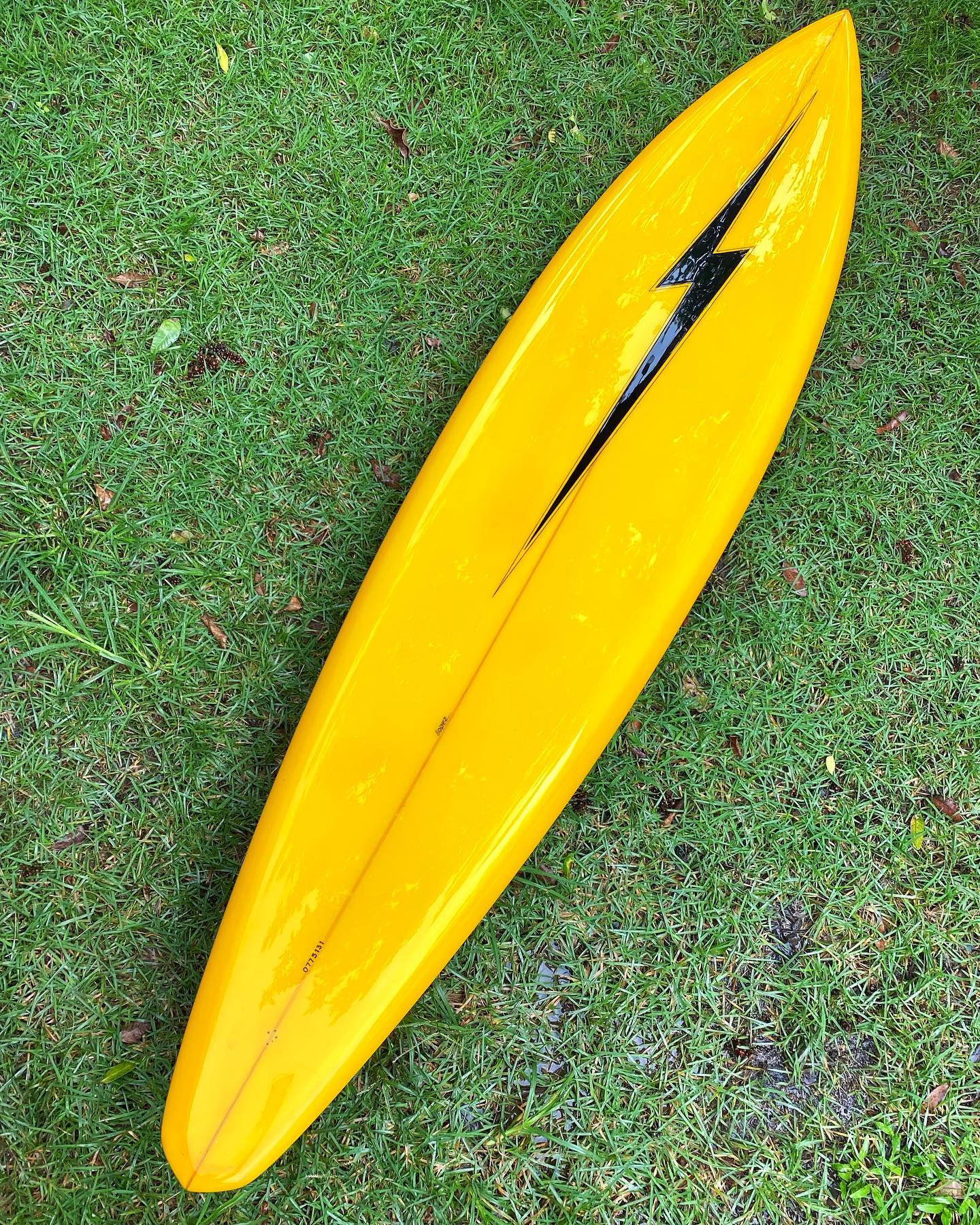 Vintage Yoshinoli Ueda surfboard from Lightning Bolt