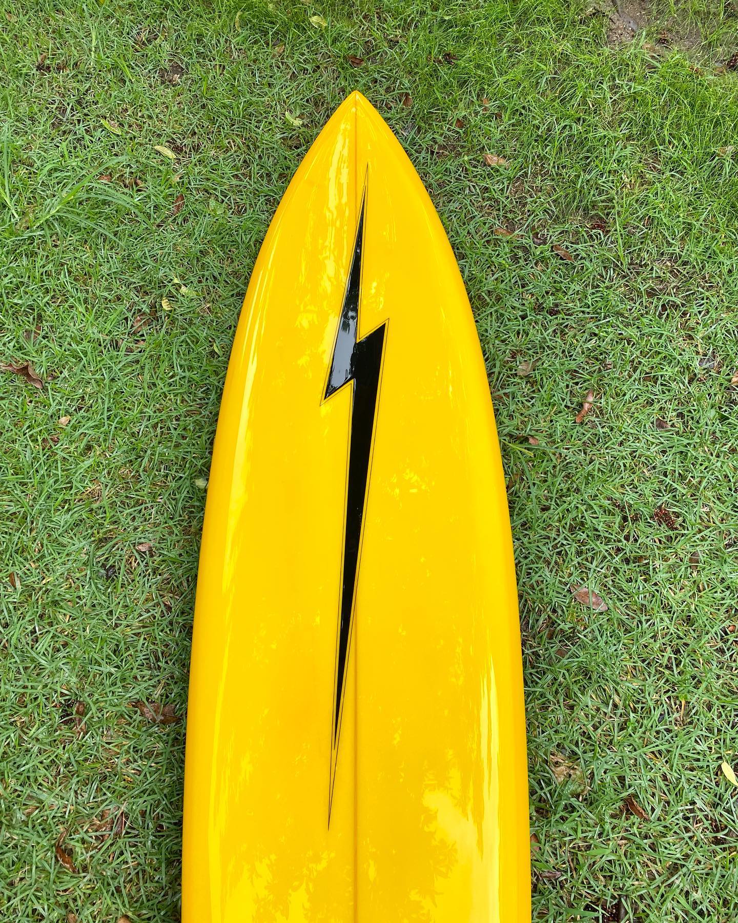 Vintage Yoshinoli Ueda surfboard from Lightning Bolt