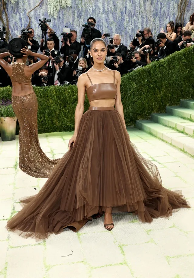 Misty Copeland at the Met Gala 2026, wearing a brown gown with a flowing silhouette. 📸: Vogue/Conde Nast #DailyTribune #TRIBUNELIFE