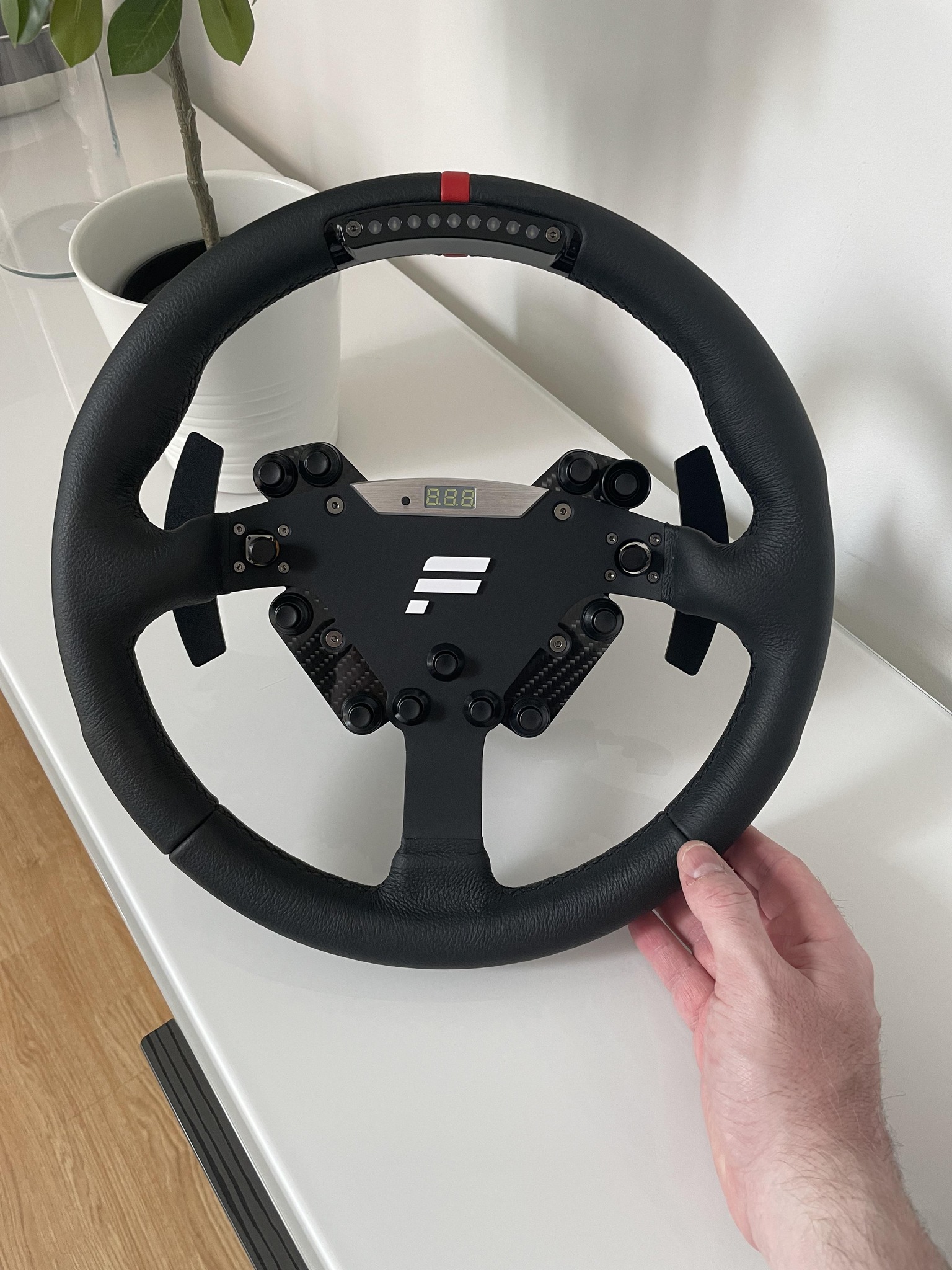 Who owns a Fanatec ClubSport RS steering wheel?