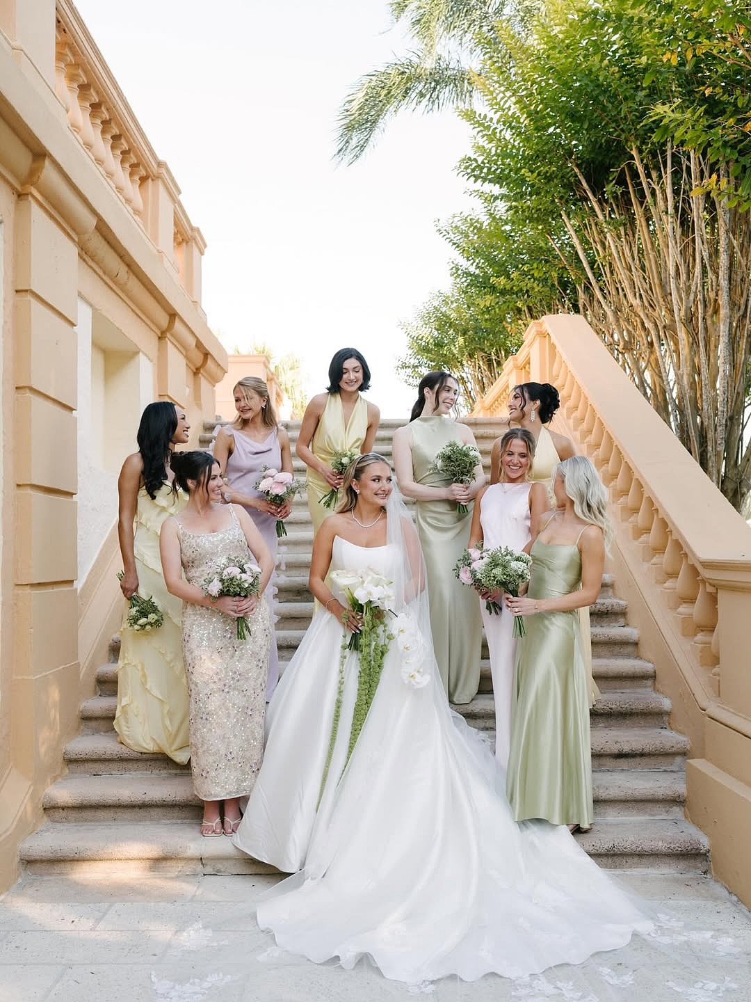 When the bridesmaids understood the color palette assignment. ✨ Count us in for babes in lavender, yellow, and green! @maddierichter16 said I Do to Jesse on Valentine's Day wearing our @danytabet BLYTHE