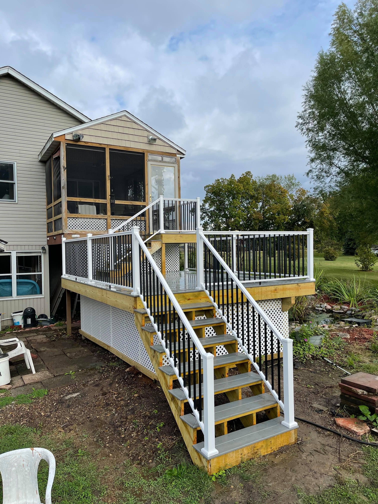 Removal of old deck and frame. New treated framing,Trex decking and ...