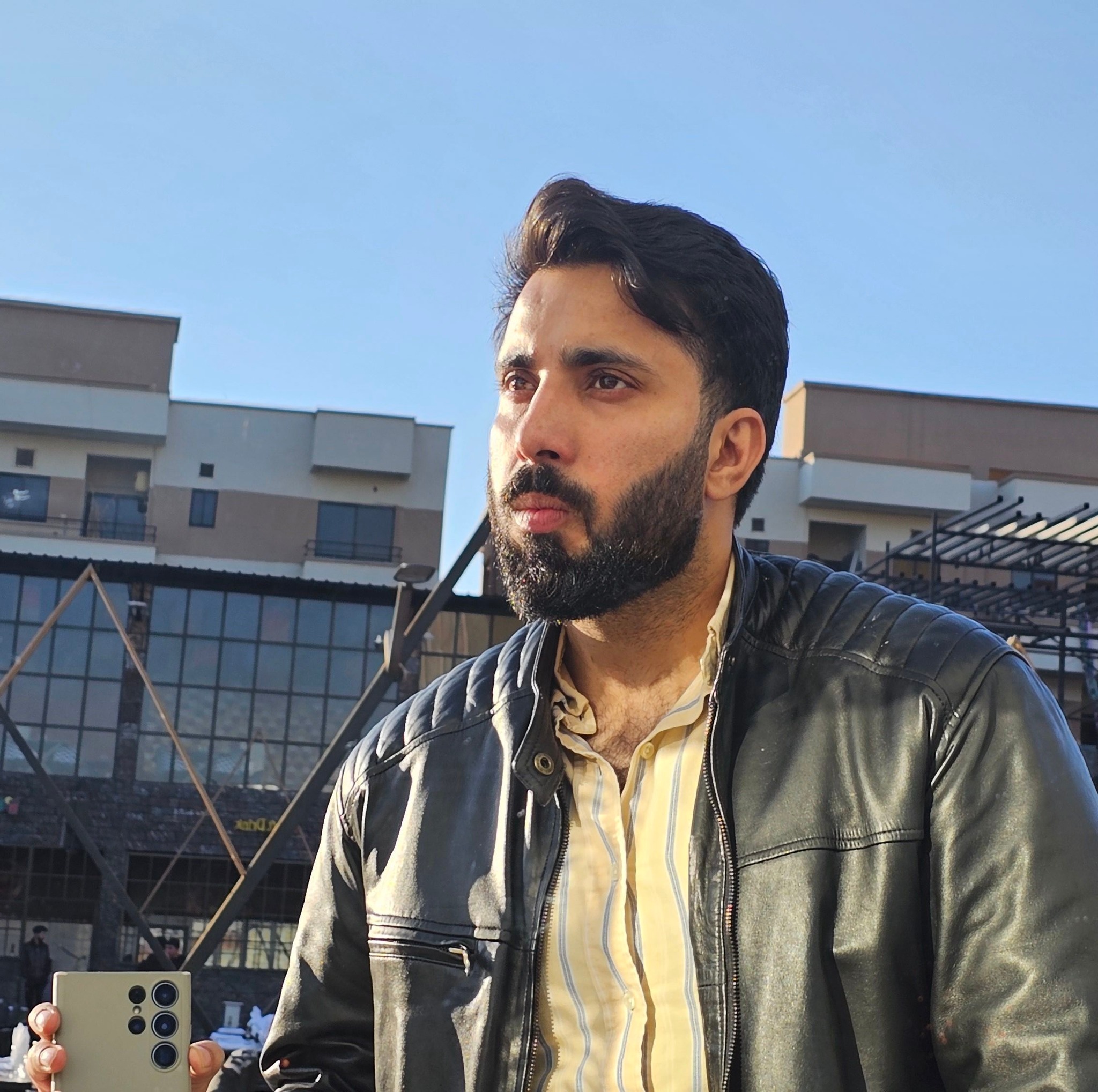 M. Talha