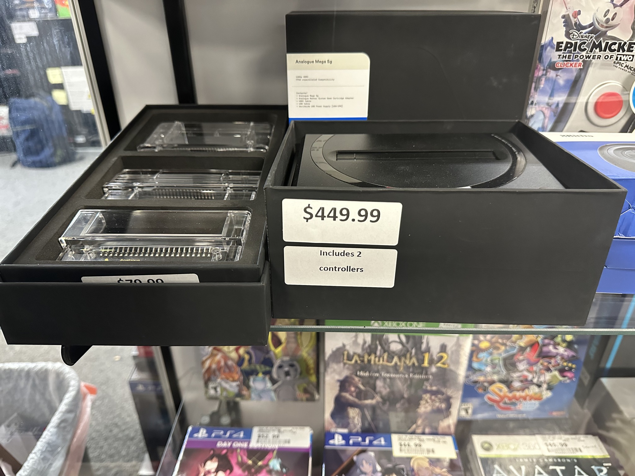 I spy an Analogue Mega Sg (Sega Genesis FPGA clone) at a game shop. 👀