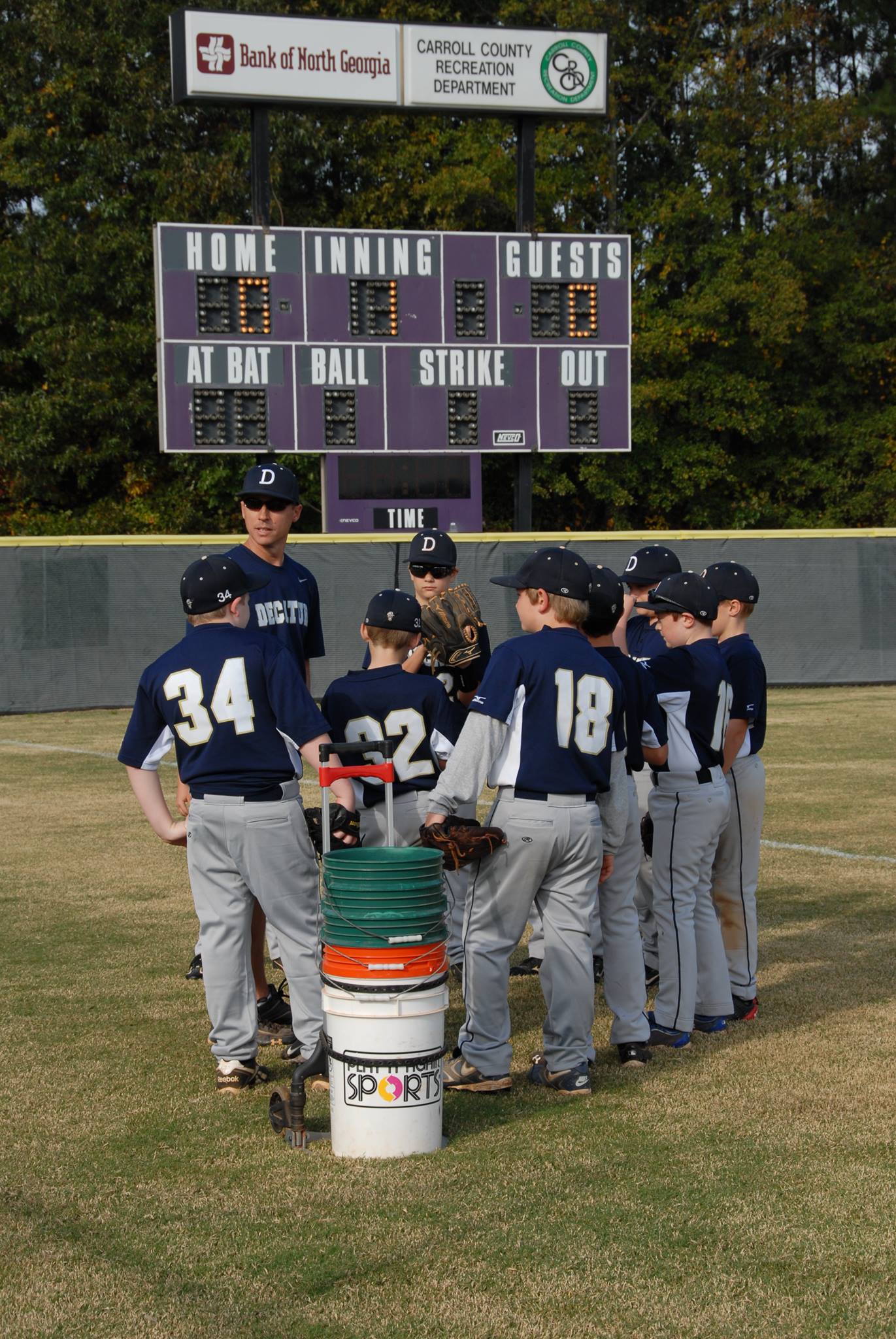 Decatur Baseball Club - Coach Joiner having a typical 