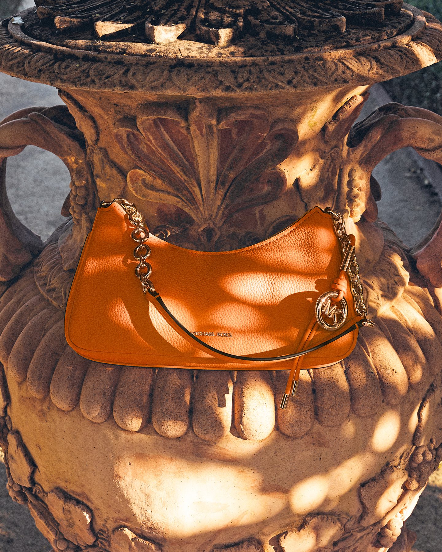 Mimosa, anyone? Our orange-hued Nolita Pochette is the perfect