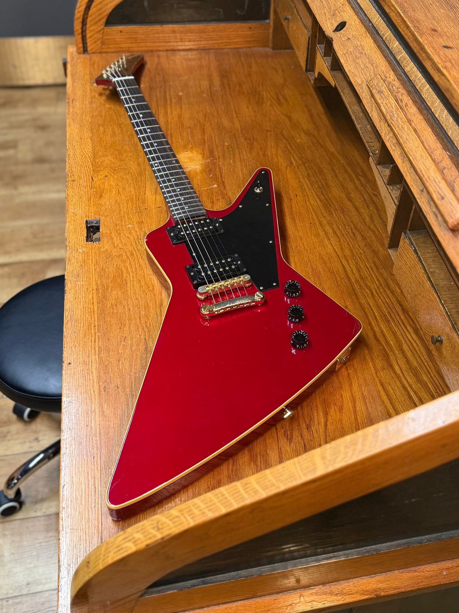 A 1983 Gibson CMT Explorer with red finish on neck and body. This 