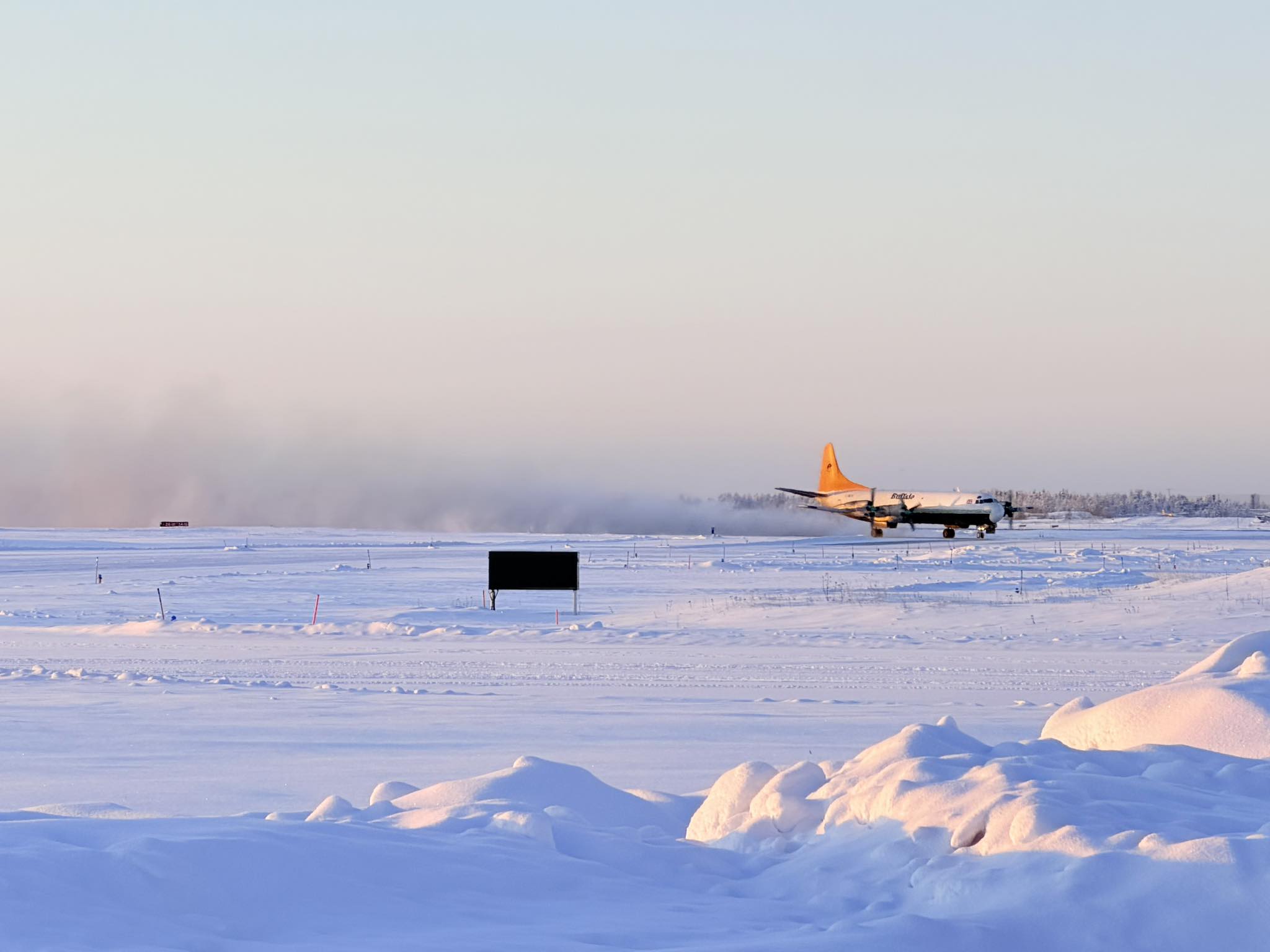 Mikey - The Lockheed Electra kicking up some Snow yesterday evening ...