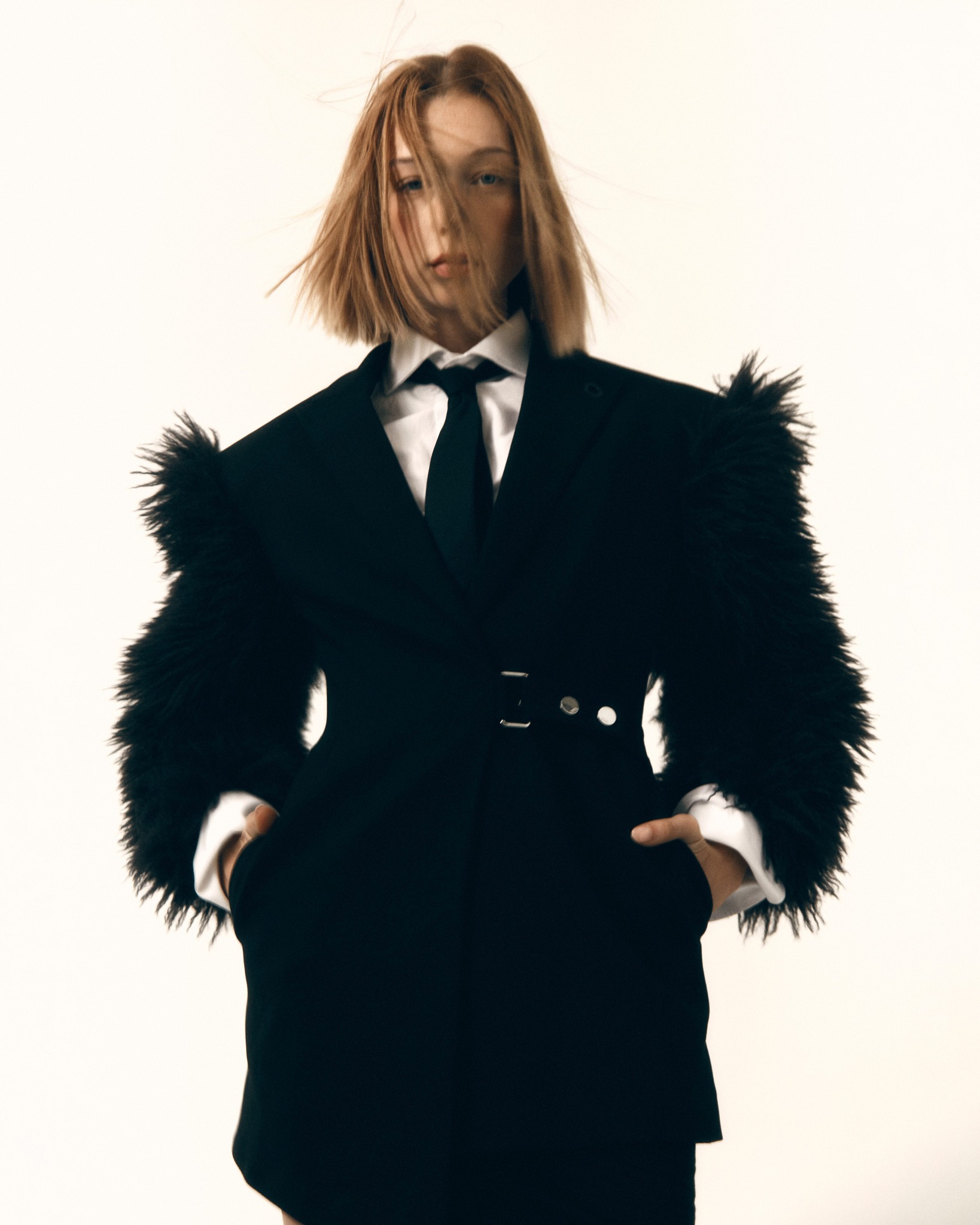 A KARL signature: the black jacket. “One is never underdressed or