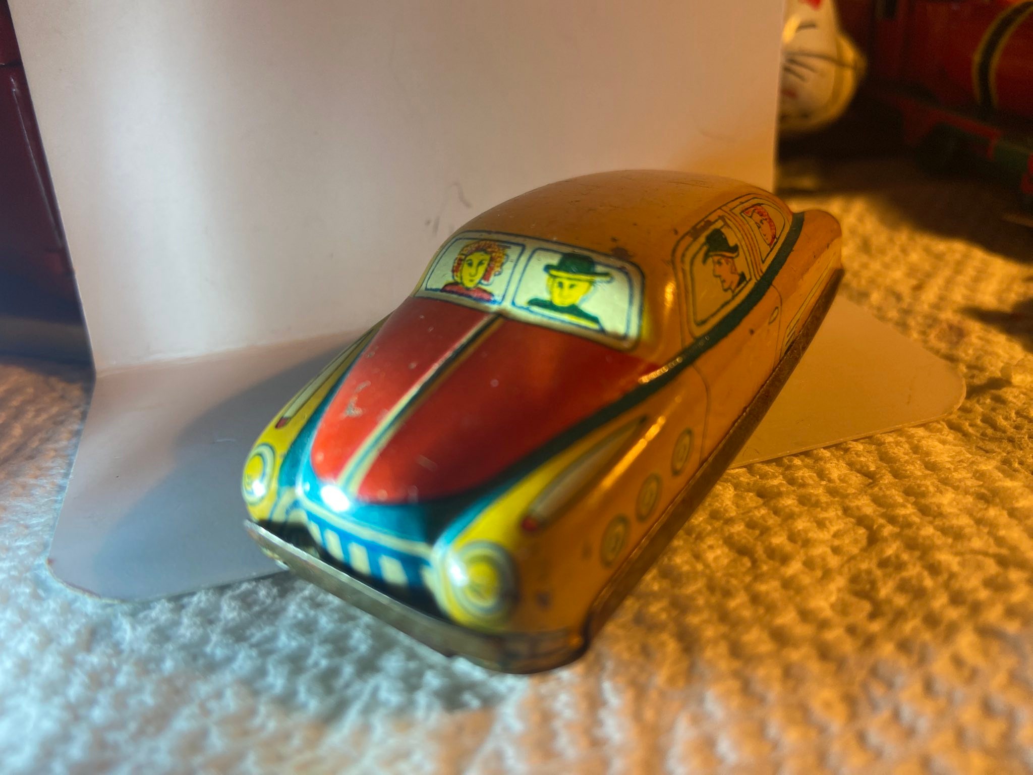 Vintage Sears tin friction toy car carrier
