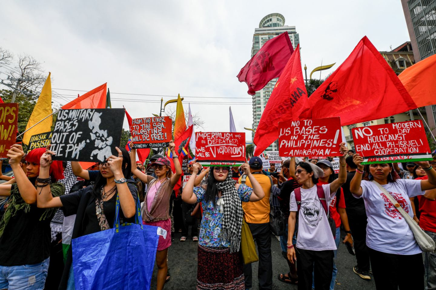 ABS-CBN - Members of Bagong Alyansang Makabayan (Bayan) hold a protest ...