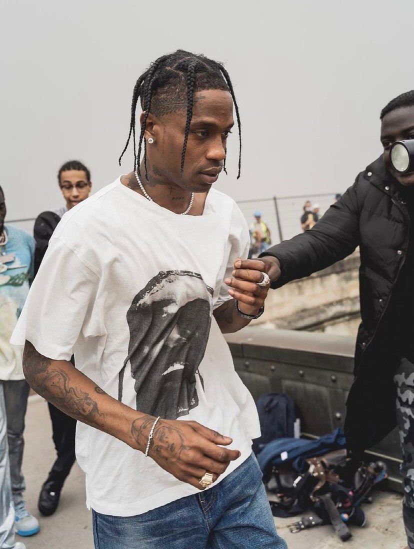 Travis Scott wearing an unreleased Dior x Pop Smoke tee 🕊️