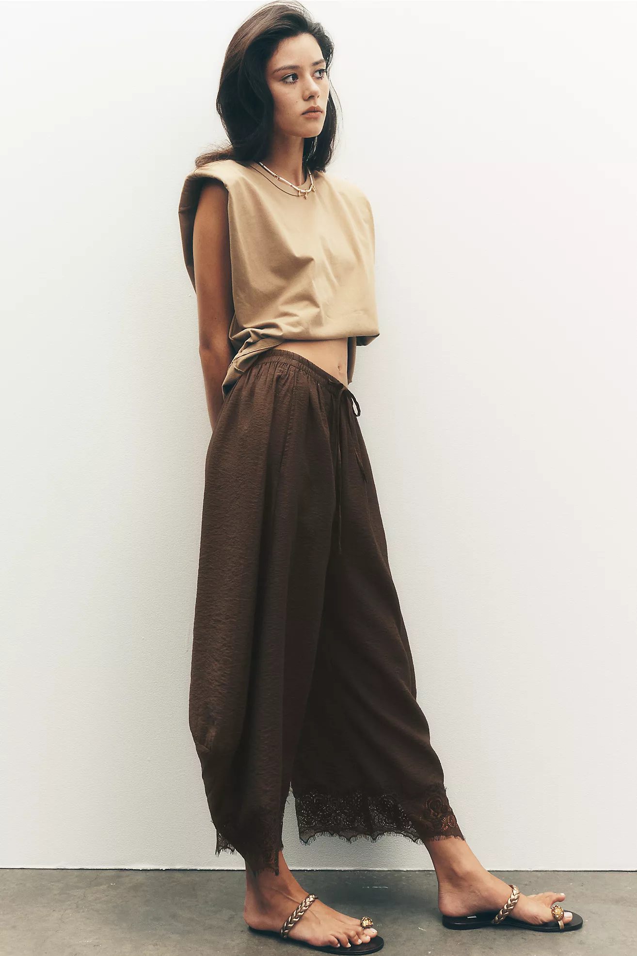 Flattering fit, flirtatious details, our Cropped Lace-Hem Trousers
