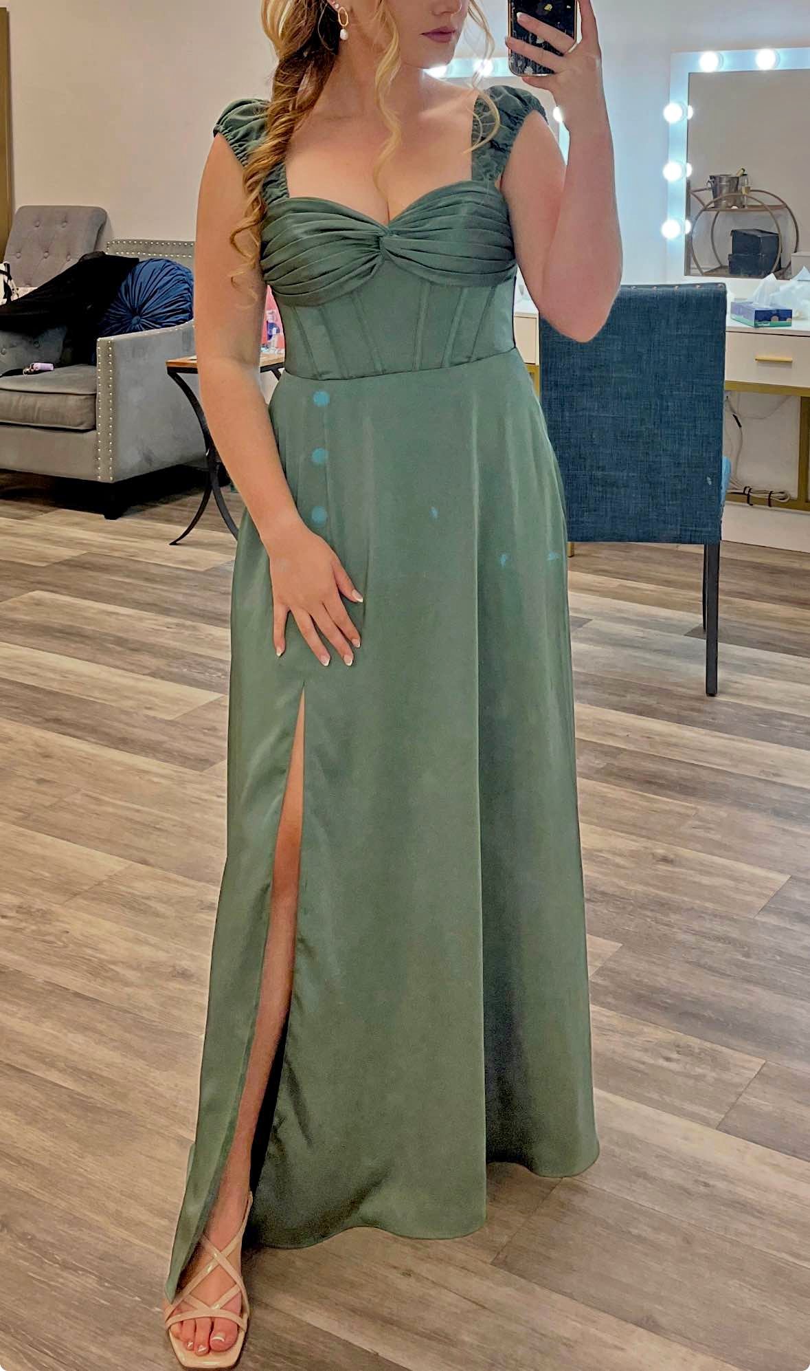 poses in bodycon dress ALLURA MAXI or tailored outerwear for product--cascade ruffle dress Cloth Size:M Dusty Pink and Sage