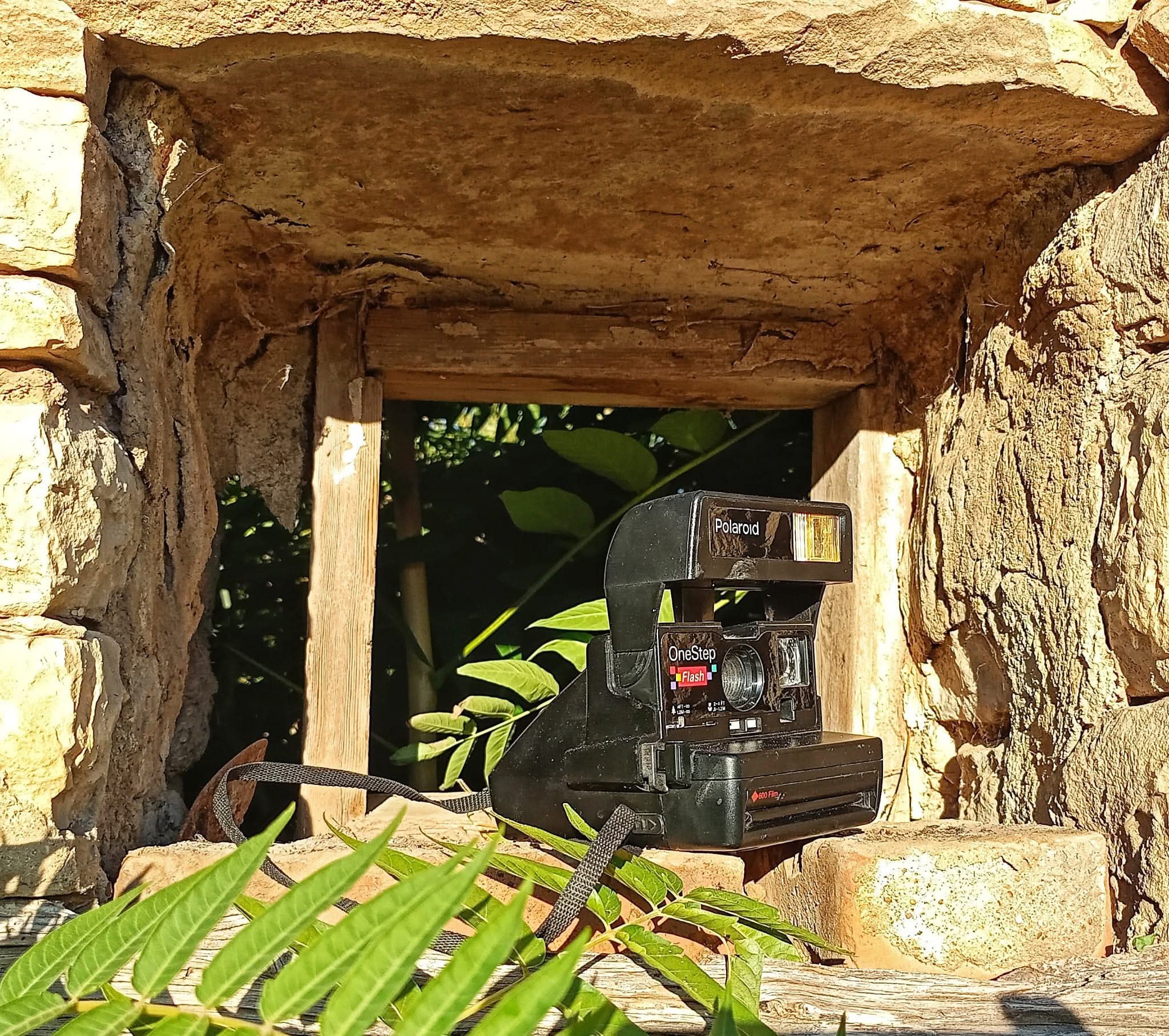 A boxy design with a flip-cover that reveals the lens, the 1986