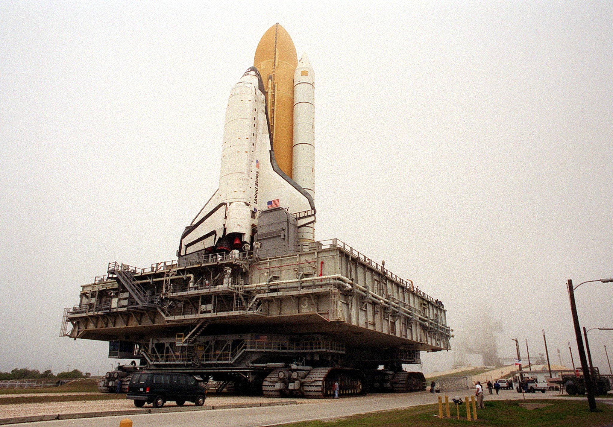 Blast - Space Shuttle Discovery nears the ramp to the top of Launch Pad ...