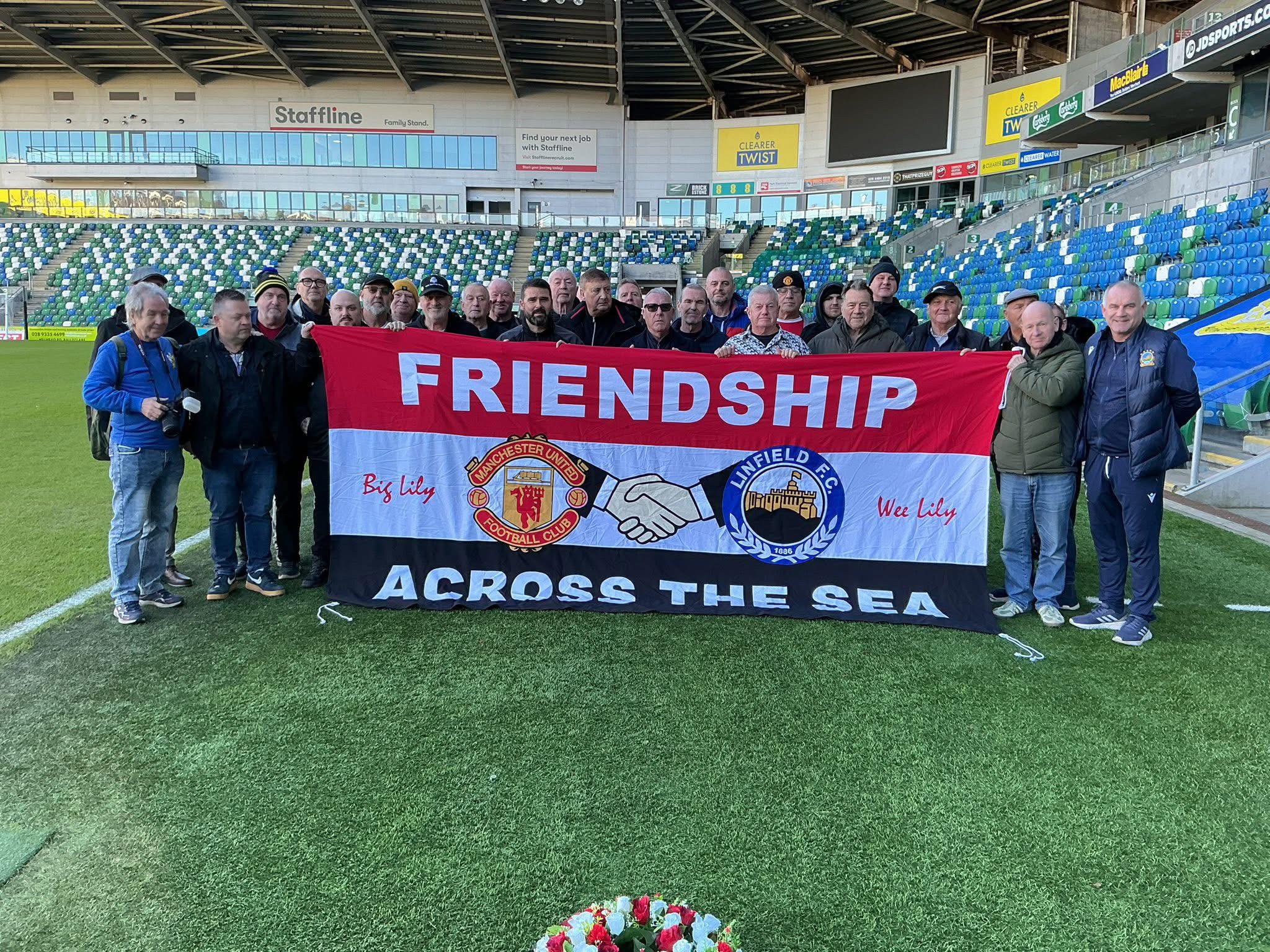 A Wee Lily Flag of Friendship was presented to Linfield’s David Healy ...