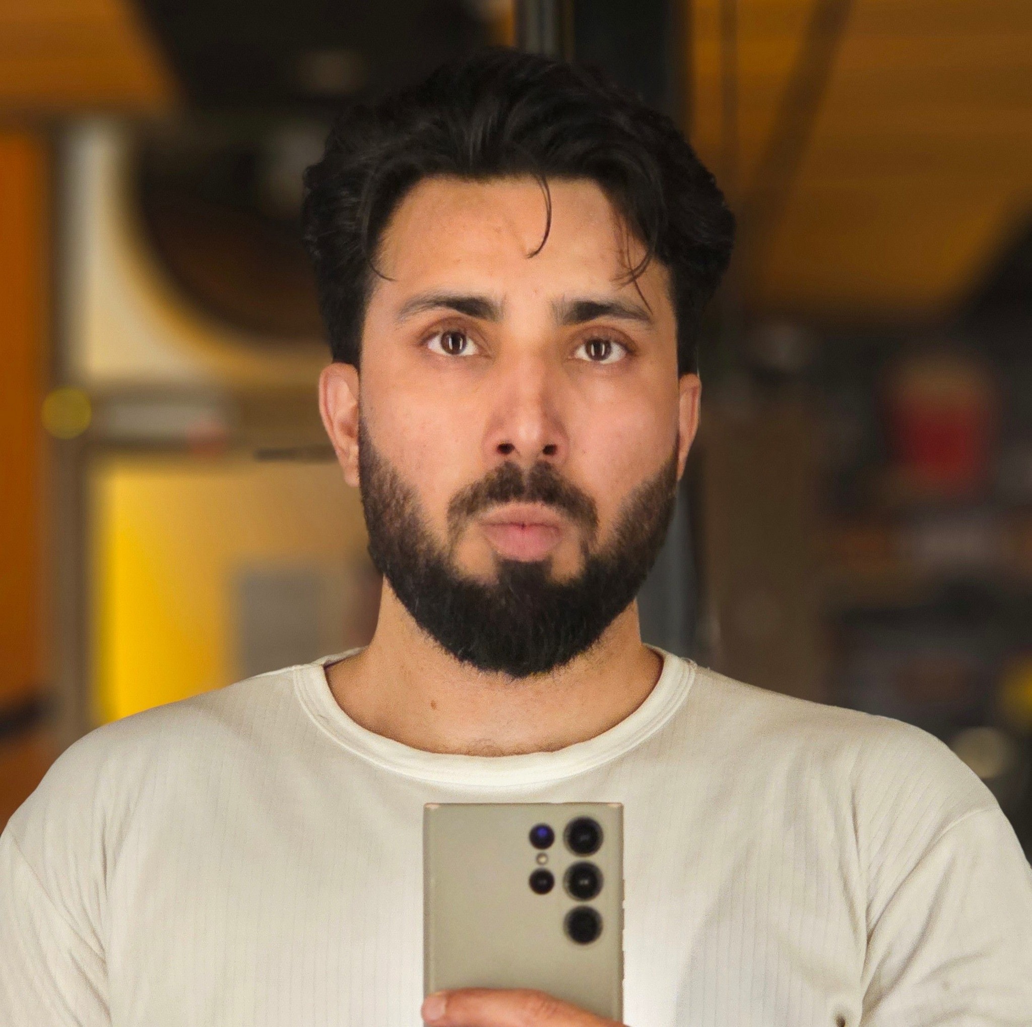 M. Talha
