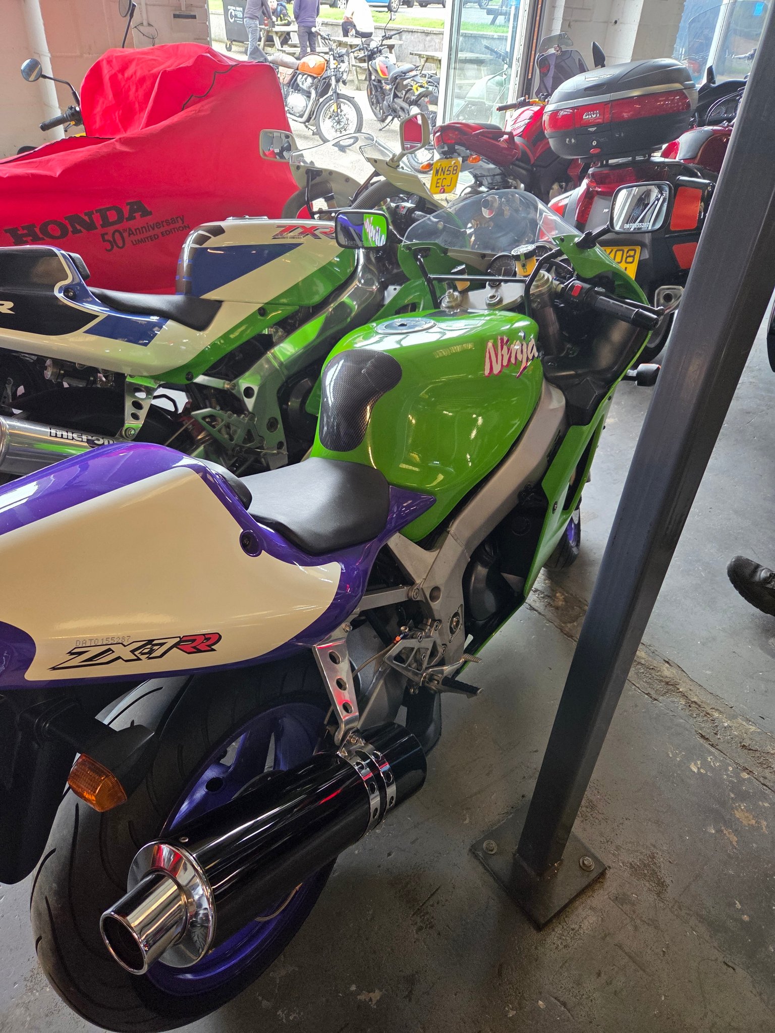 Husband considers Kawasaki ZX7RR at $32,000