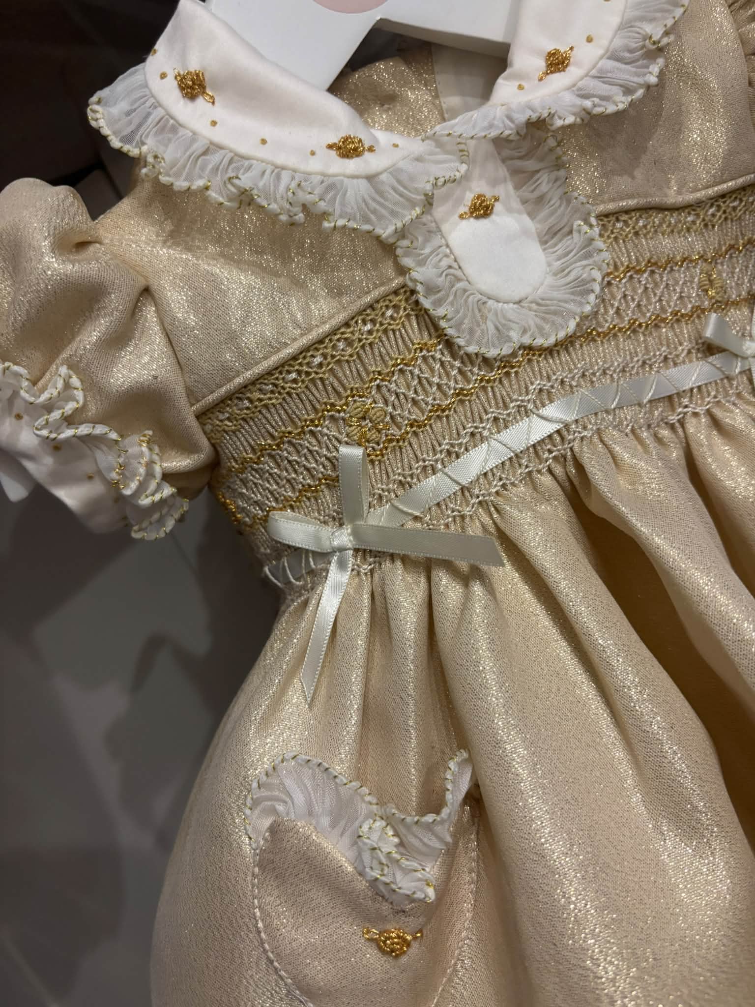 ✨ Champagne Gold Hand‑Smocked Dress ✨ Timeless elegance in every detail. Shimmering gold fabric. Absolutely beautiful for Christmas, christenings, weddings, birthdays & special moments 👑 💳 Pay your way — easy &