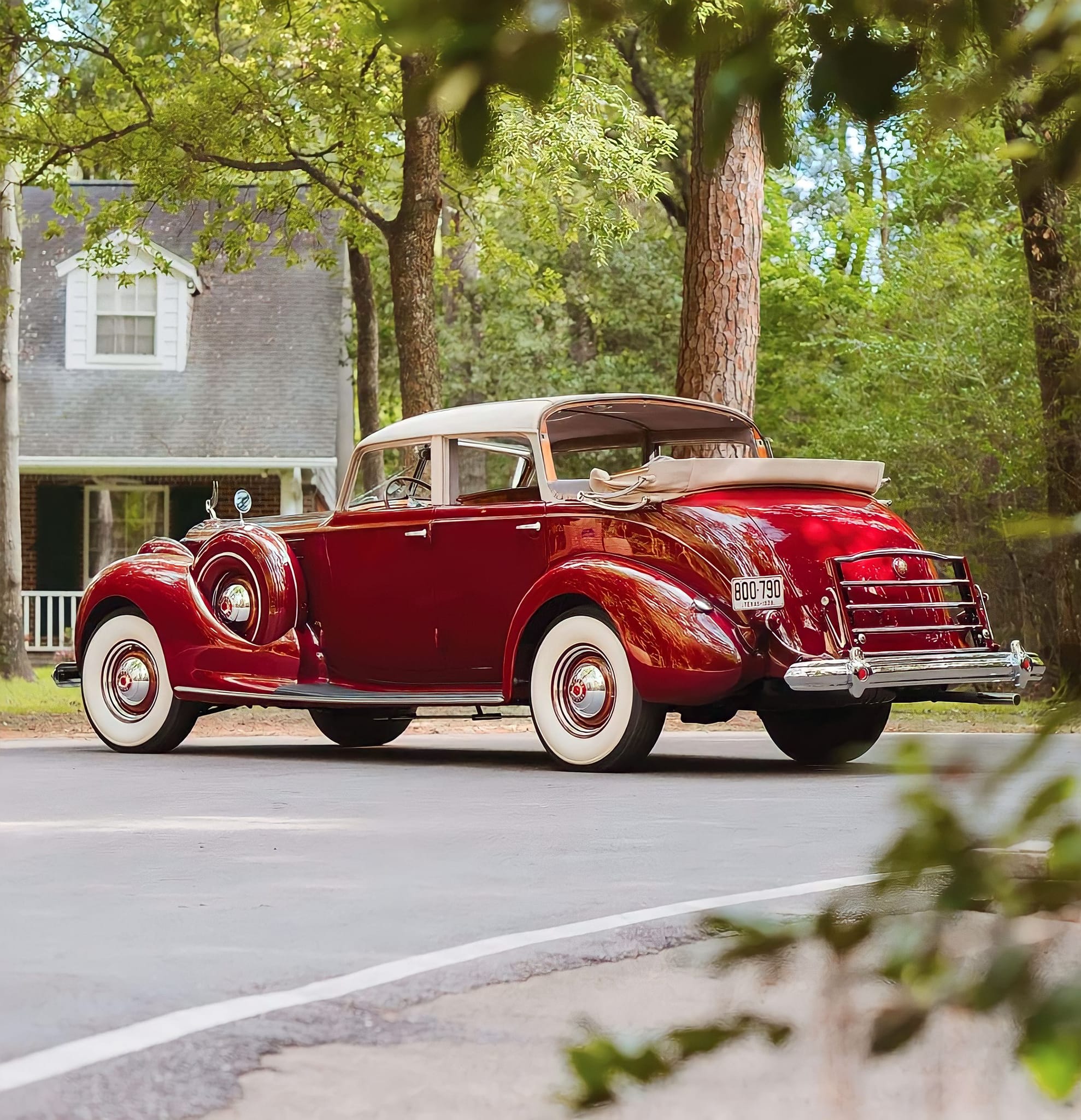 Here's a 1939 Packard Twelve Touring Convertible by Brunn.