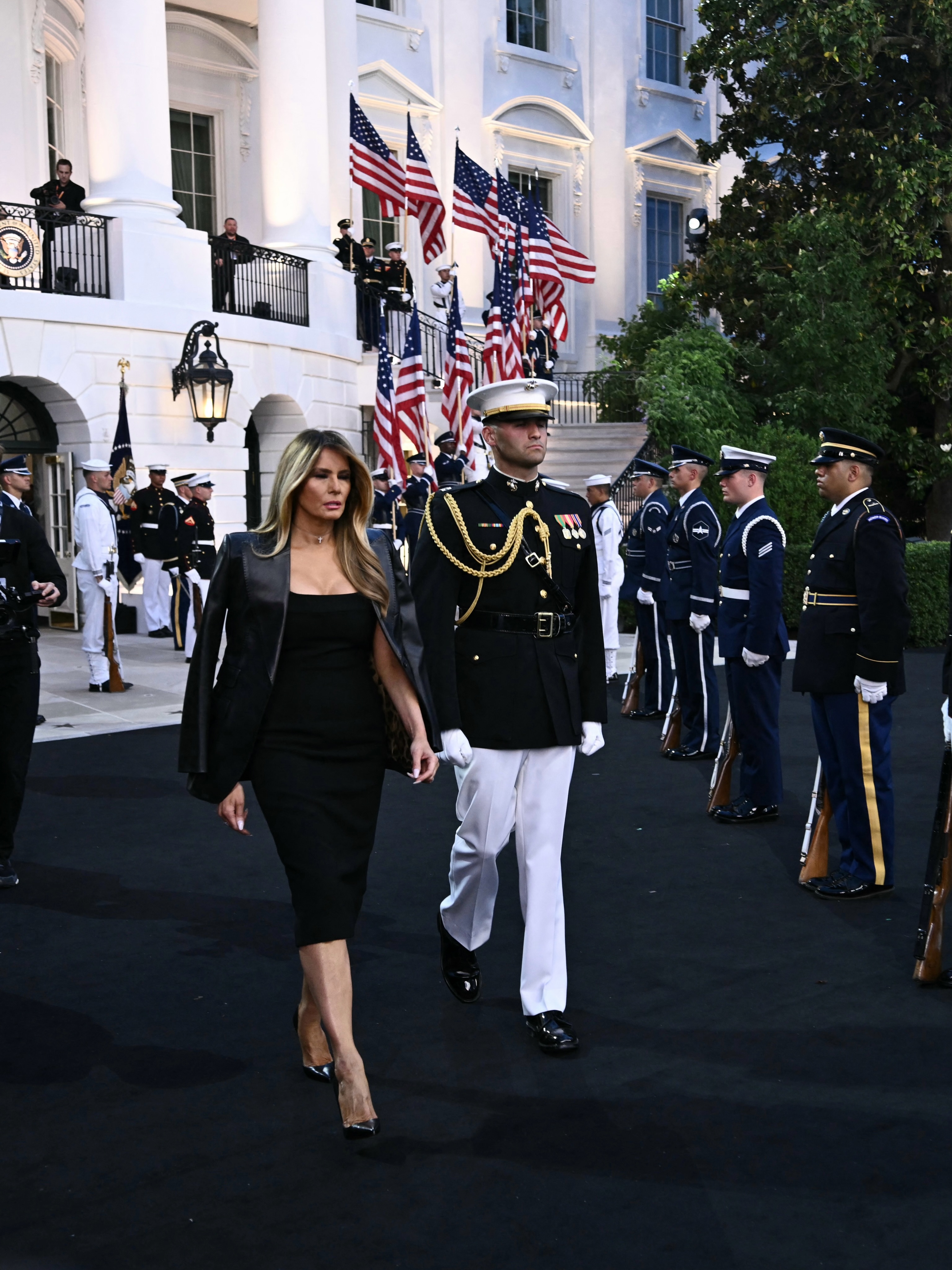 melania trump black dress looked stunning in a chic midi as she arrived for the UFC Freedom 250 celebrations at the White House on Sunday. The event was held in honour of Marilyn Monroe's JFK birthday Color:M-Chocolate FW26