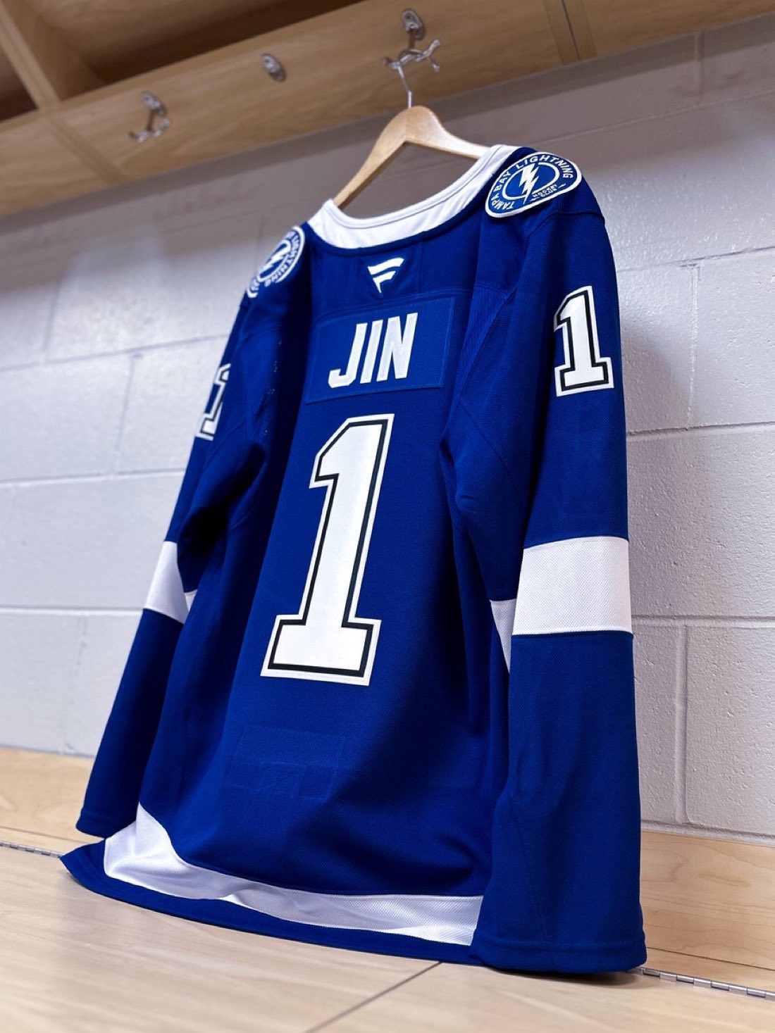 Seokjin wearing customized Tampa Bay Lightning NHL hockey jersey