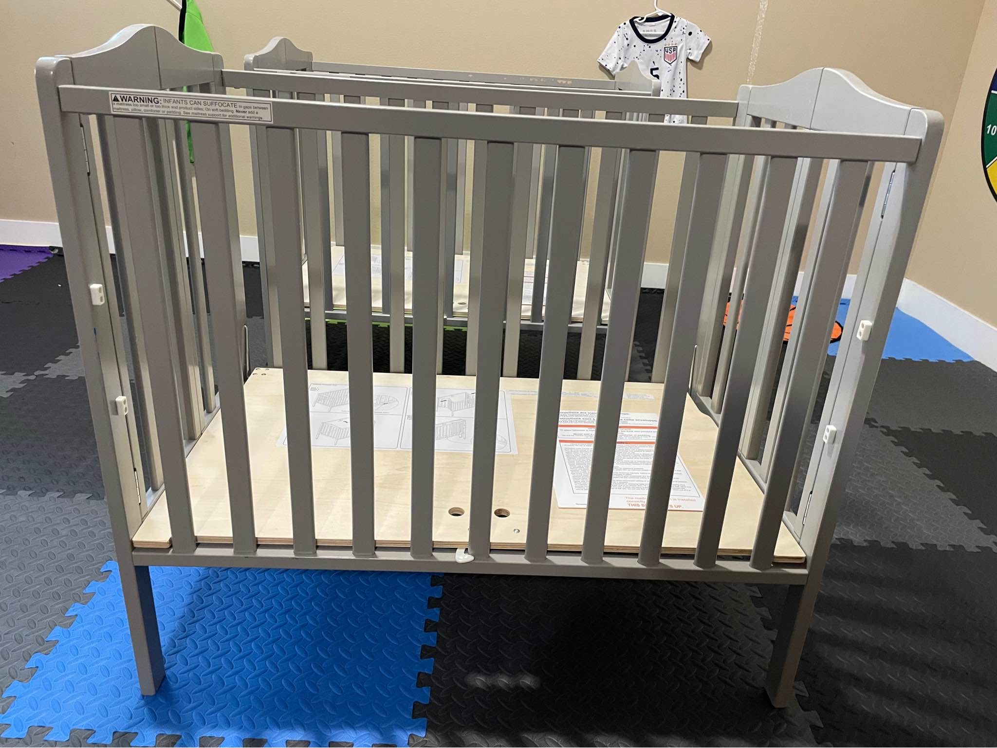 Delta Children Folding Portable Mini Baby Cribs - Cribs - Portland
