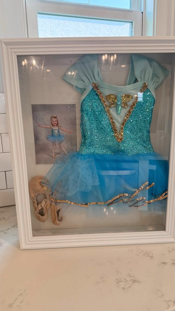 This dance costume shadow box is such a precious keepsake and would look cute on a wall too...🩰