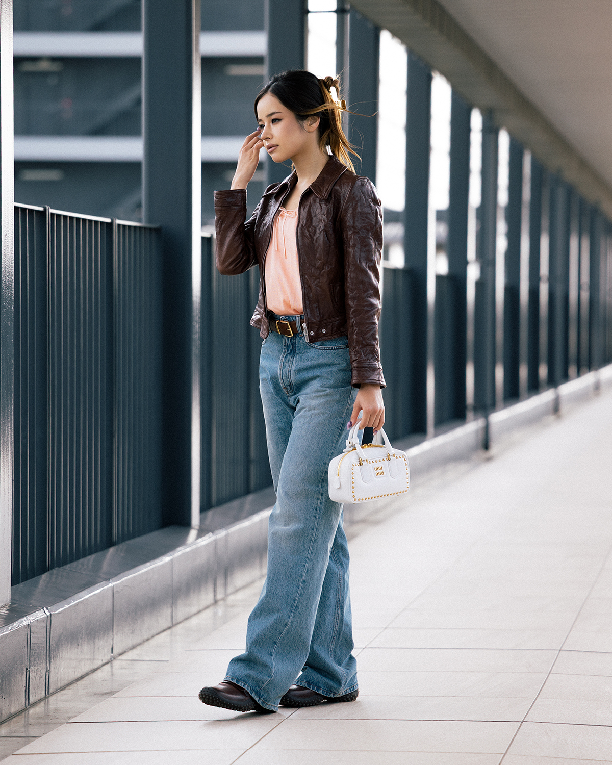 HARVEY (XG) heads to Paris in a full Miu Miu look to attend Miu