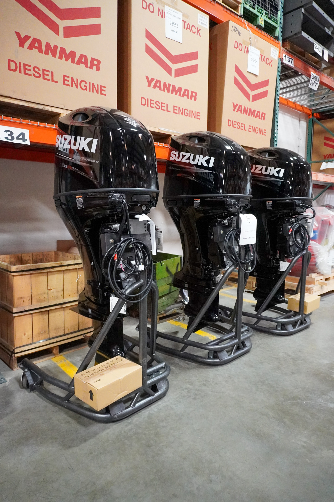 Cascade - In stock and water-ready. ⚓️ Three black Suzuki outboards ...