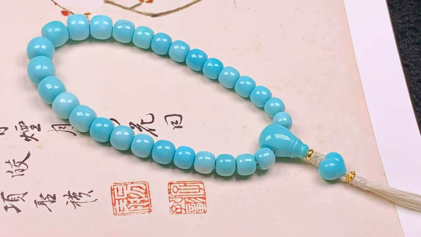 原矿高瓷精品乌兰花老型手串，尺寸15×14mm，重69克，瓷釉级，玉化料