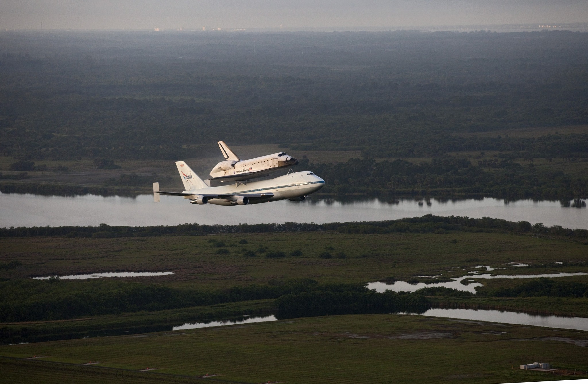 Blast - Space shuttle Endeavour, mounted atop NASA's Shuttle Carrier ...
