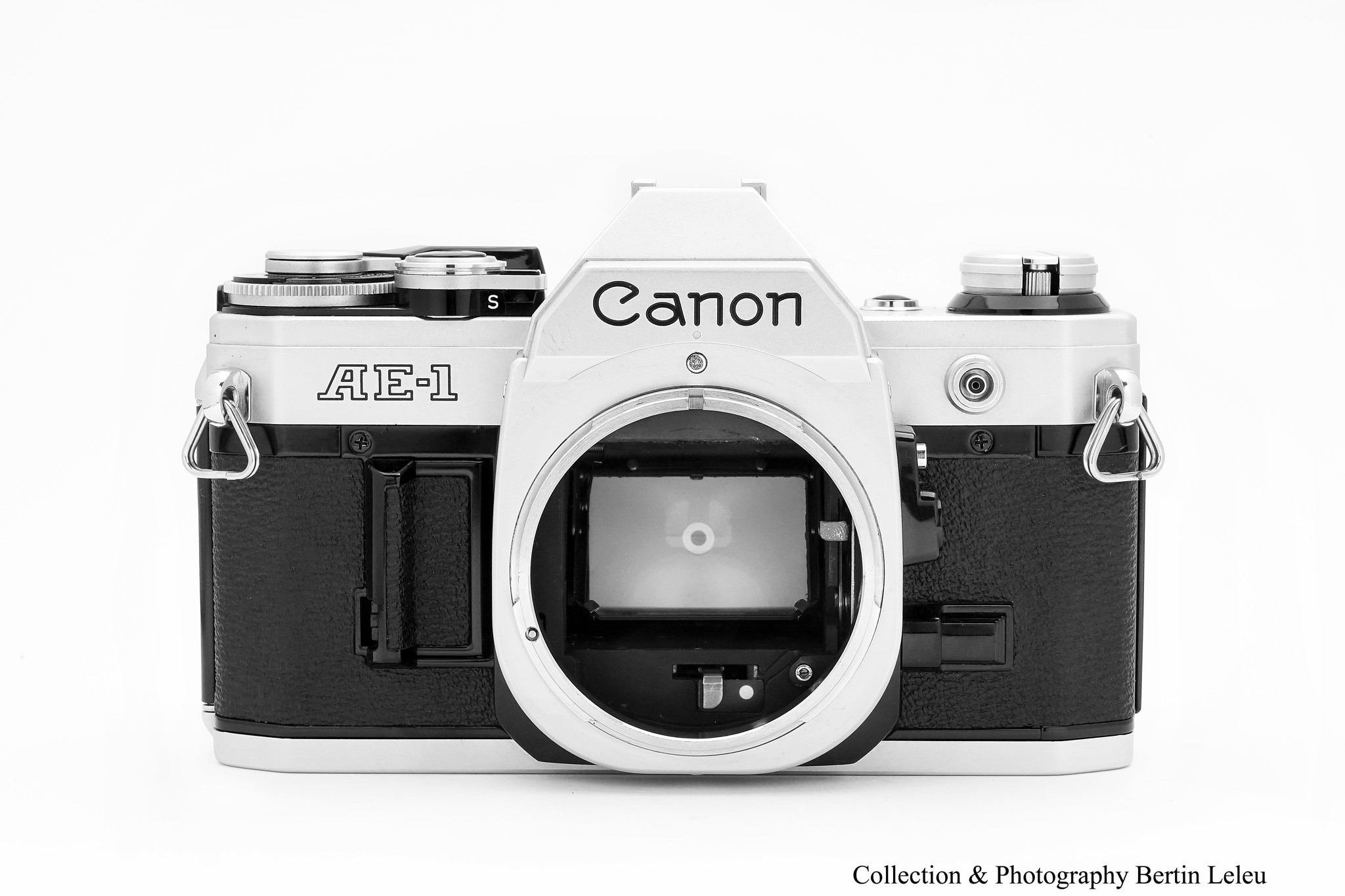 Canon AE-1 35mm film camera with 135mm F/3.5 lens, power winder A.