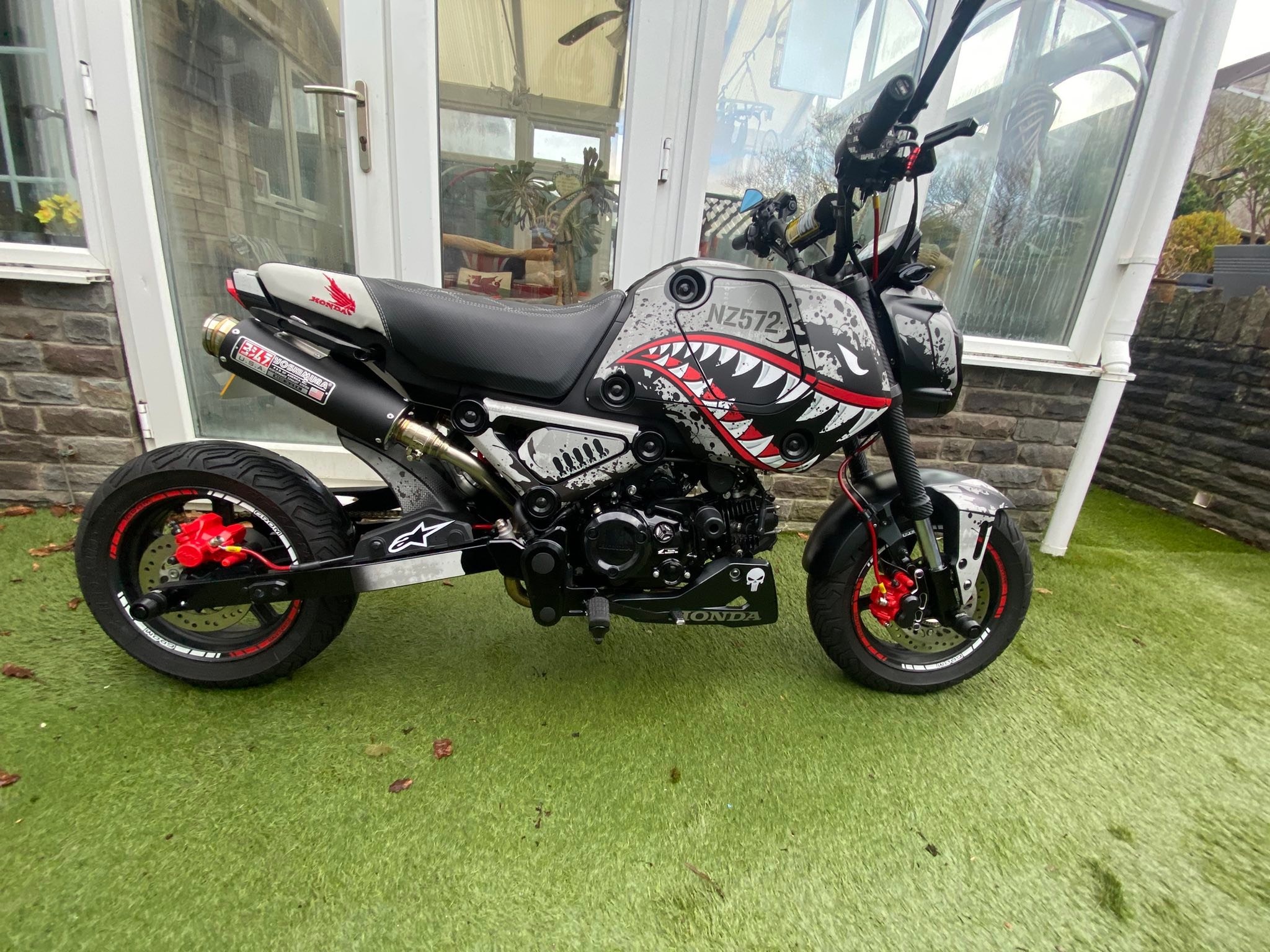 Custom-modified Honda Grom with Chimera stretch kit and Baja headlight