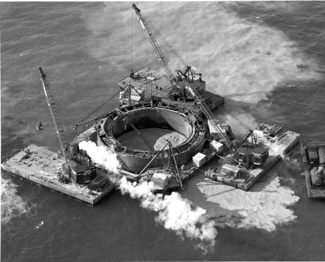Brian - Aerial view of a circular steel caisson during construction of ...