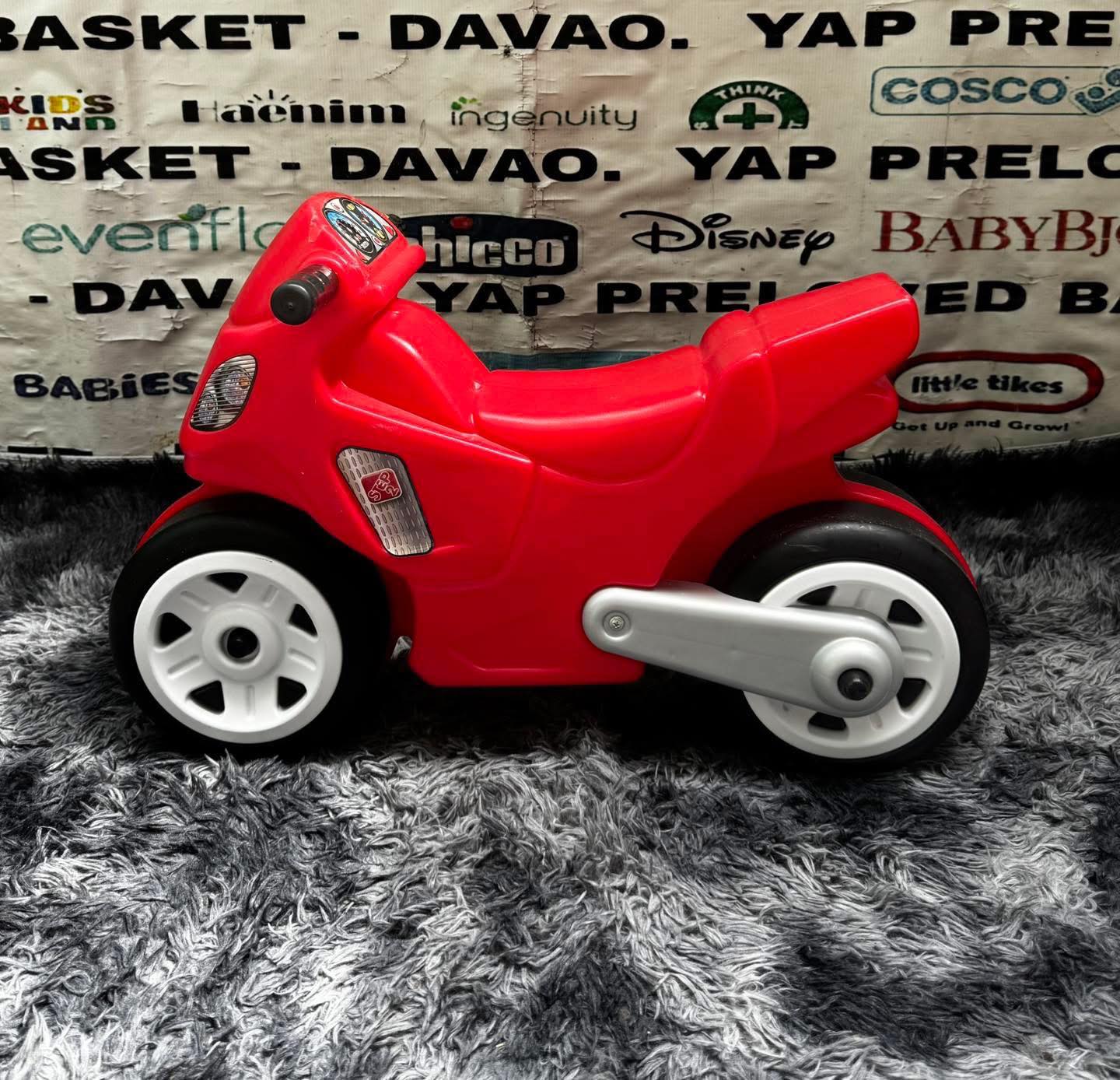 Step2 Red Motorcycle children's ride-on toy ✓ It features racer