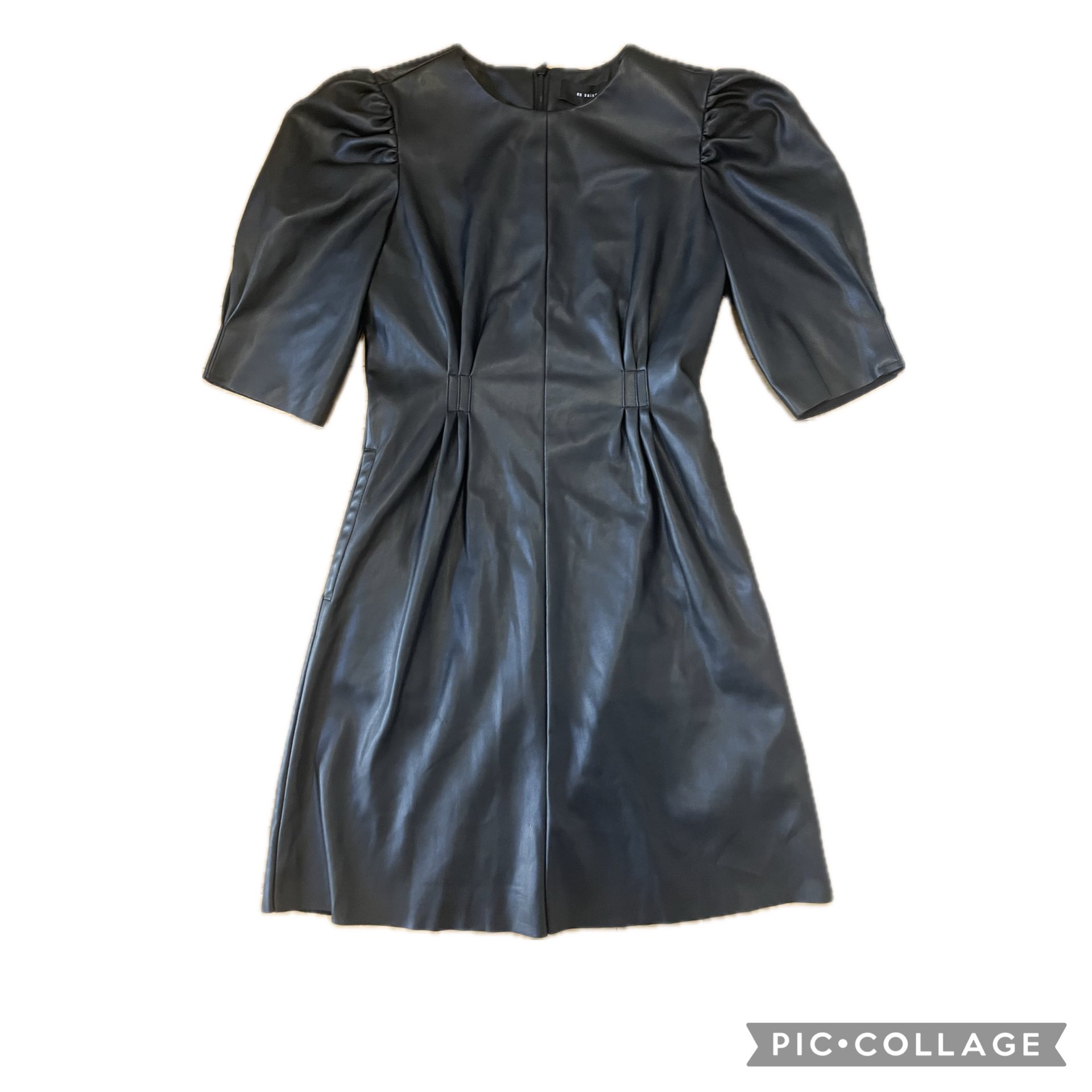 en saison leather dress Faux A stylish leather mini dress with puff sleeves and a pleated design. Condition: New with tags - Color: Black - Material: Leather collection_maggie-sottero_Maggie Bridal Collection