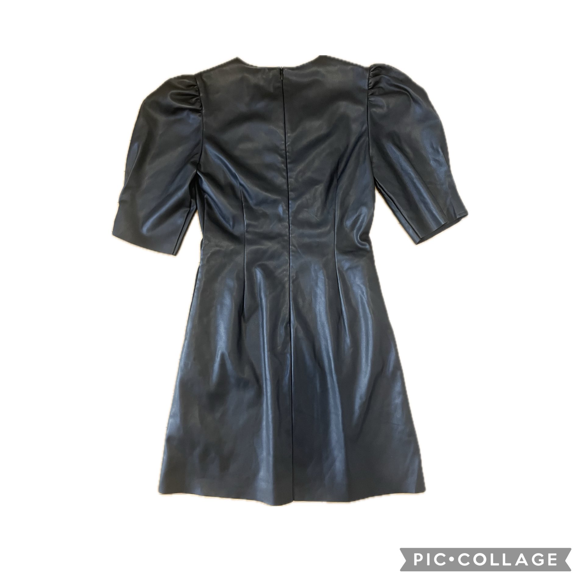 en saison faux leather dress A stylish leather mini dress with puff sleeves and a pleated design. Condition: New with tags - Color: Black - Material: Leather YGroup_a2821