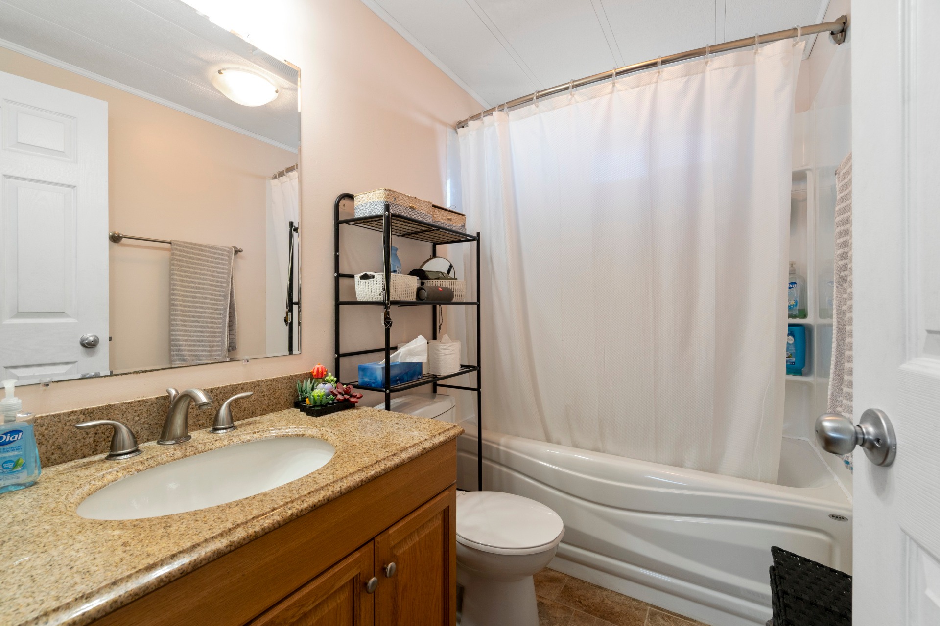 Laura - MLS 10358936 Welcome to this bright and spacious double-wide ...