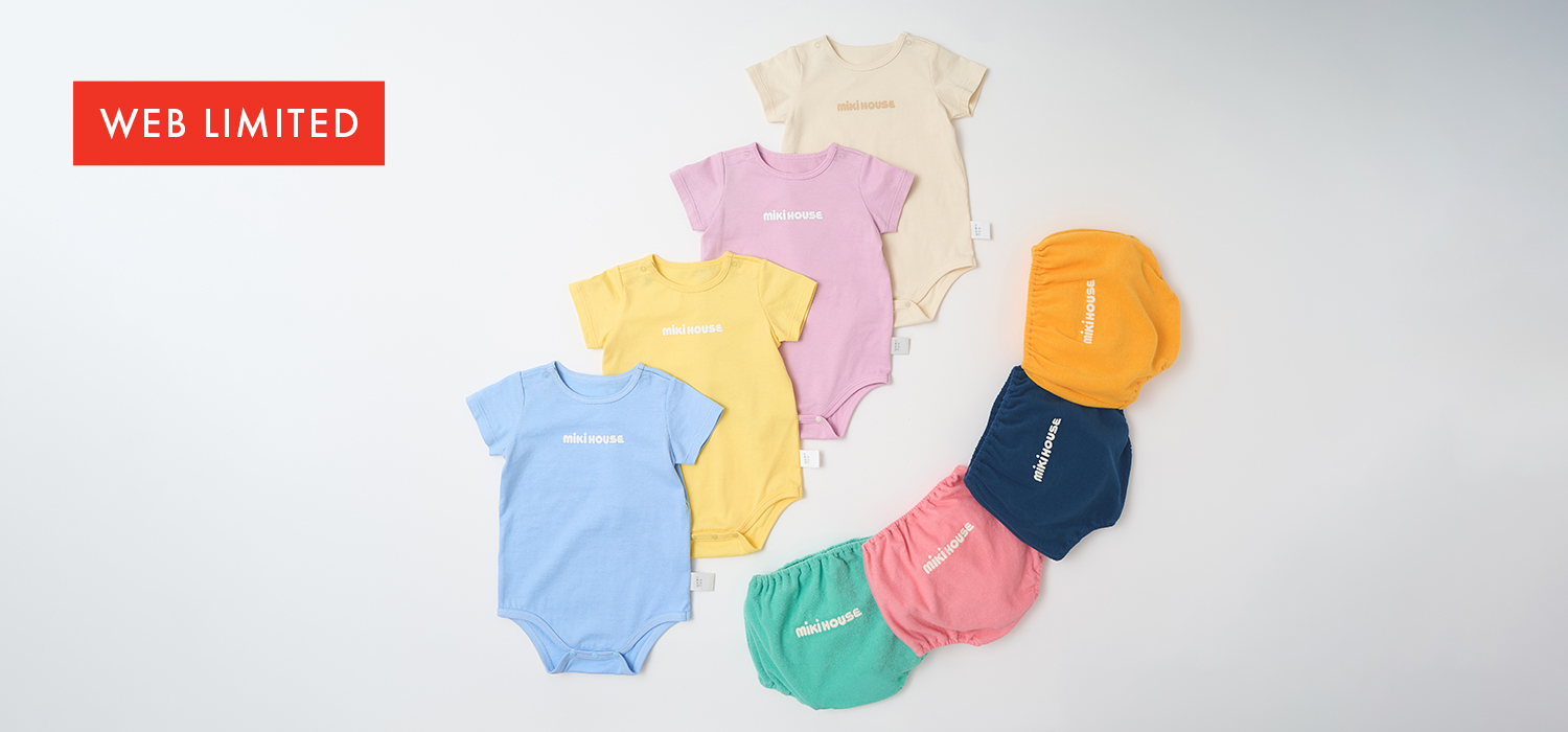 ポケットからのぞくプッチーやうさこの編みモチーフがかわいい、ニット 