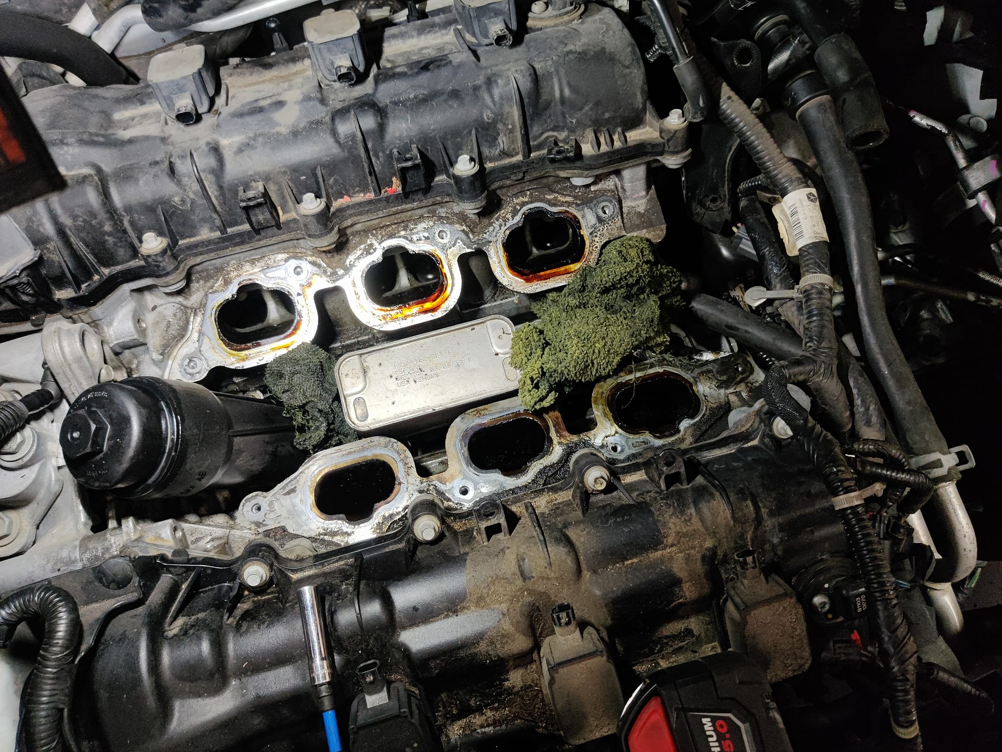 Will a paper gasket stop oil filter housing leaks?