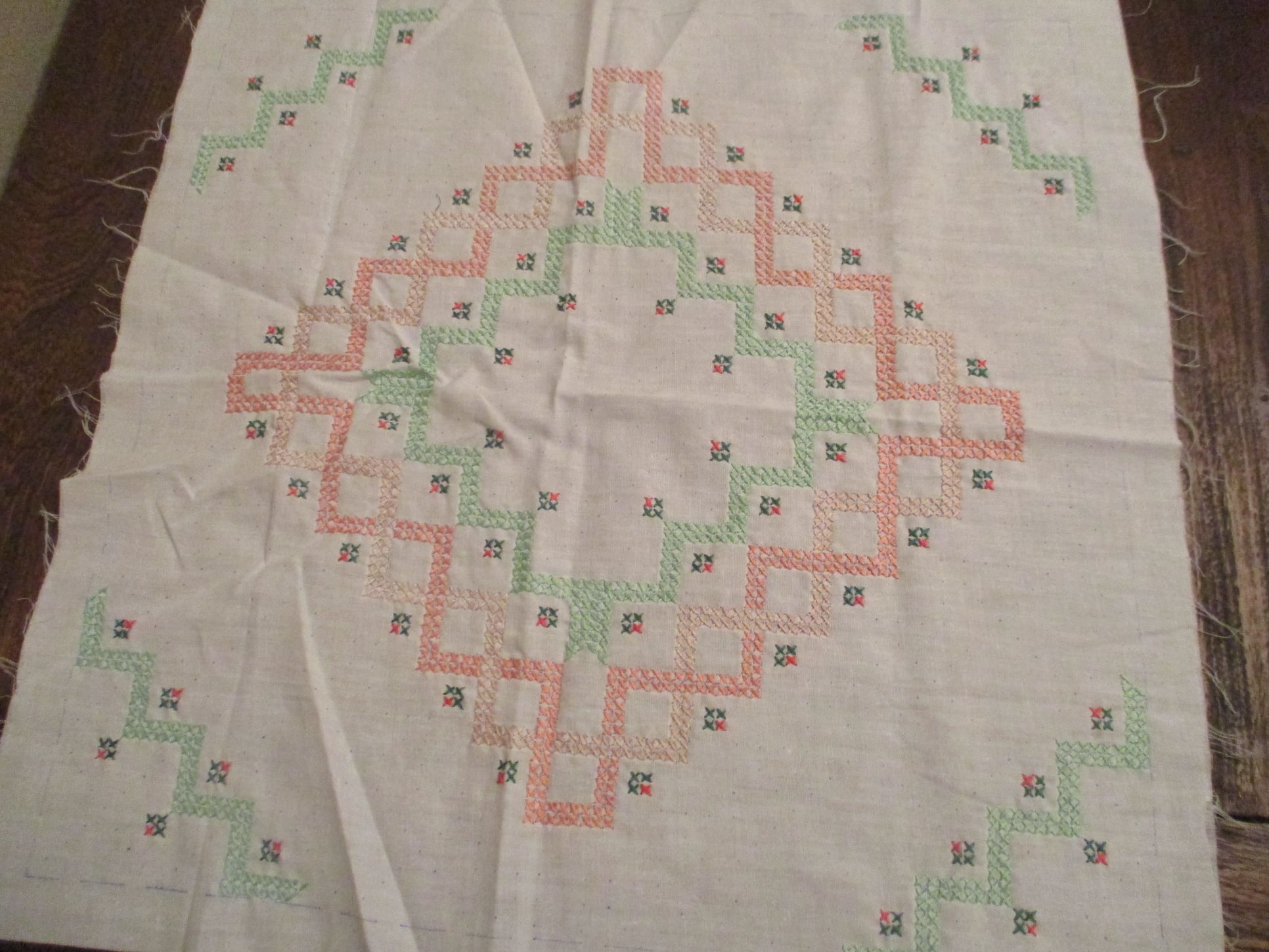 Hand-embroidered small quilt blocks from 38 years ago