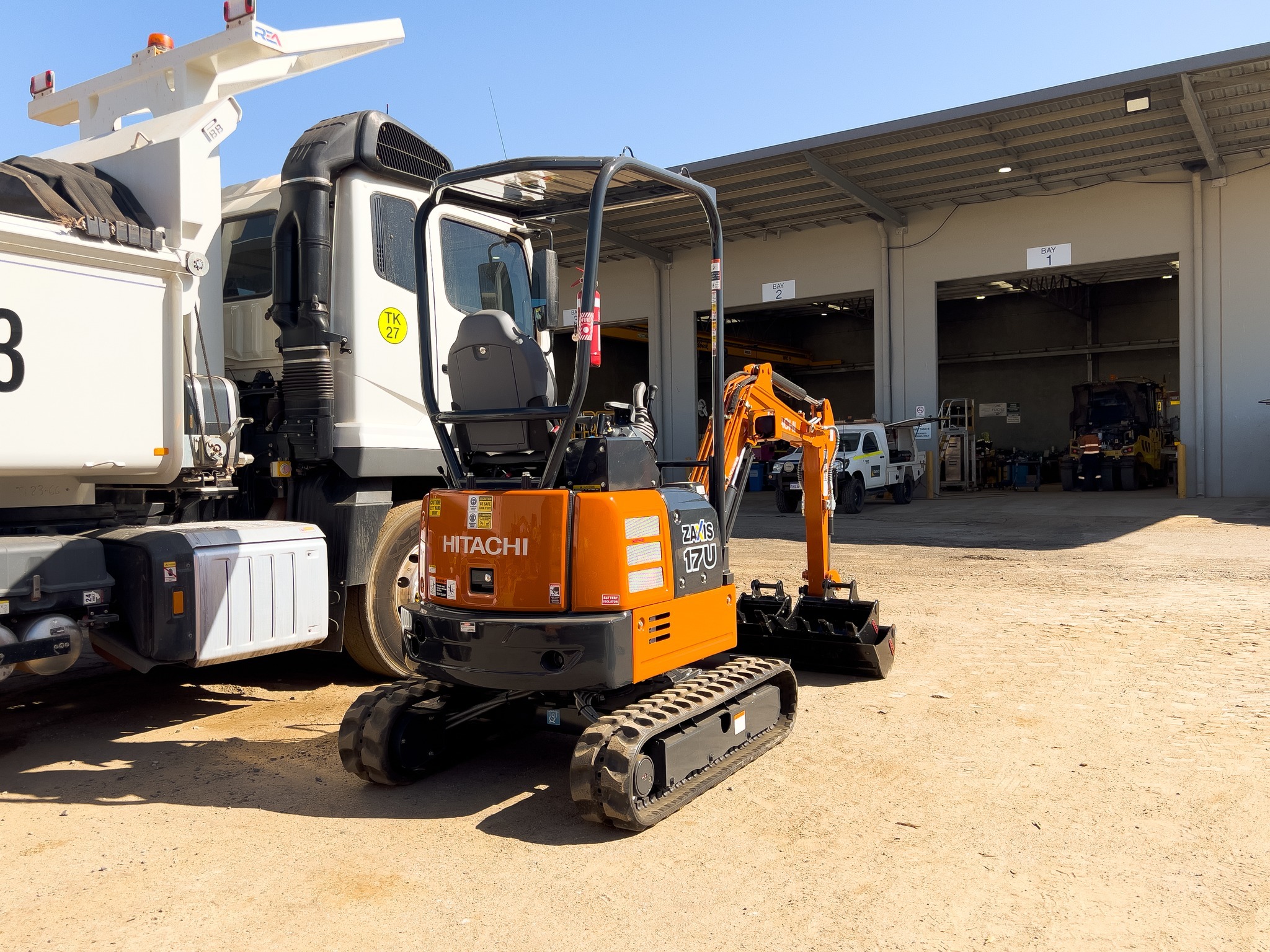 The compact 1.7-Tonne Hitachi ZX17U-5 Excavator's size allows easy