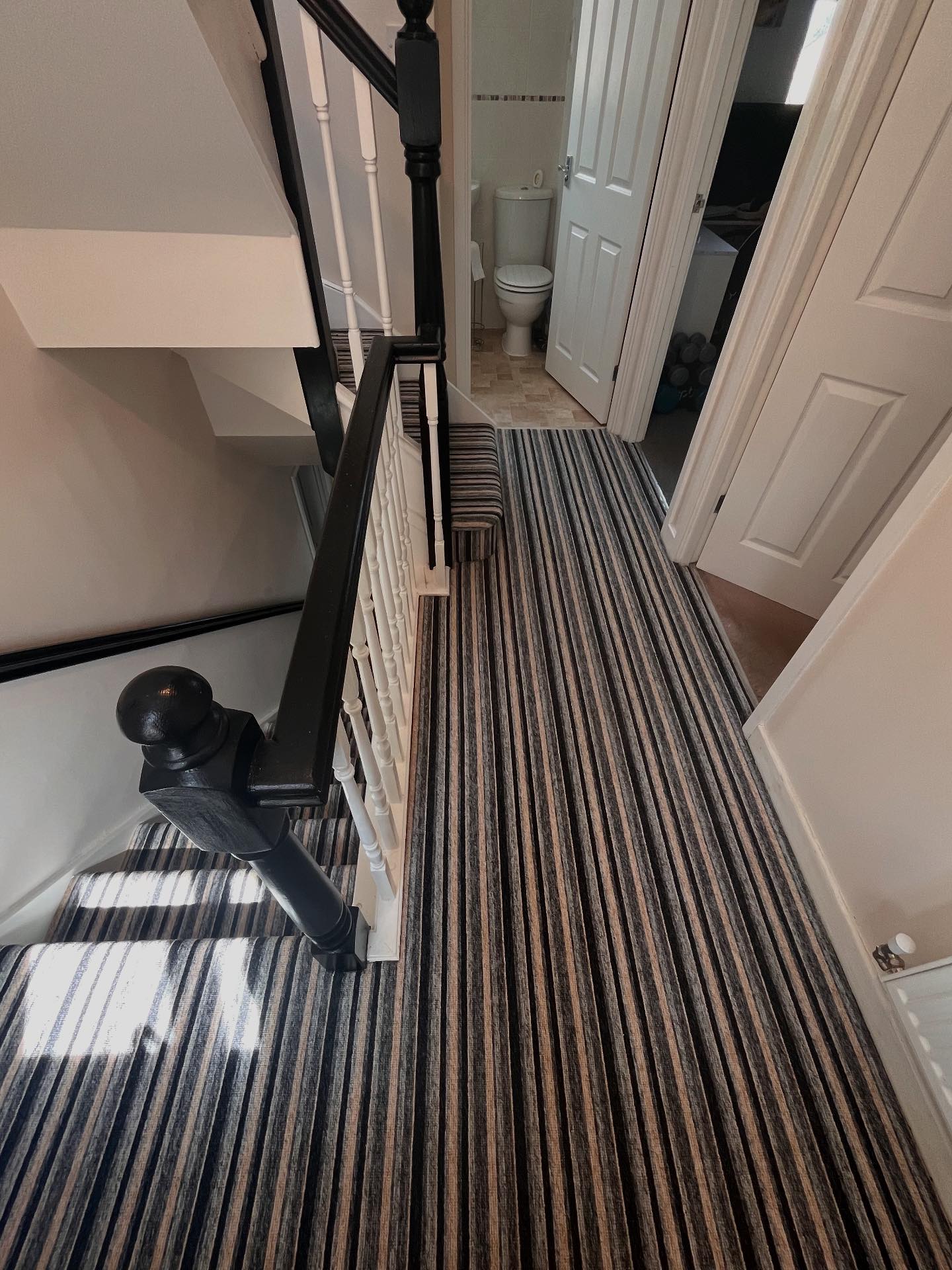 S W Carpets | Swindon Village