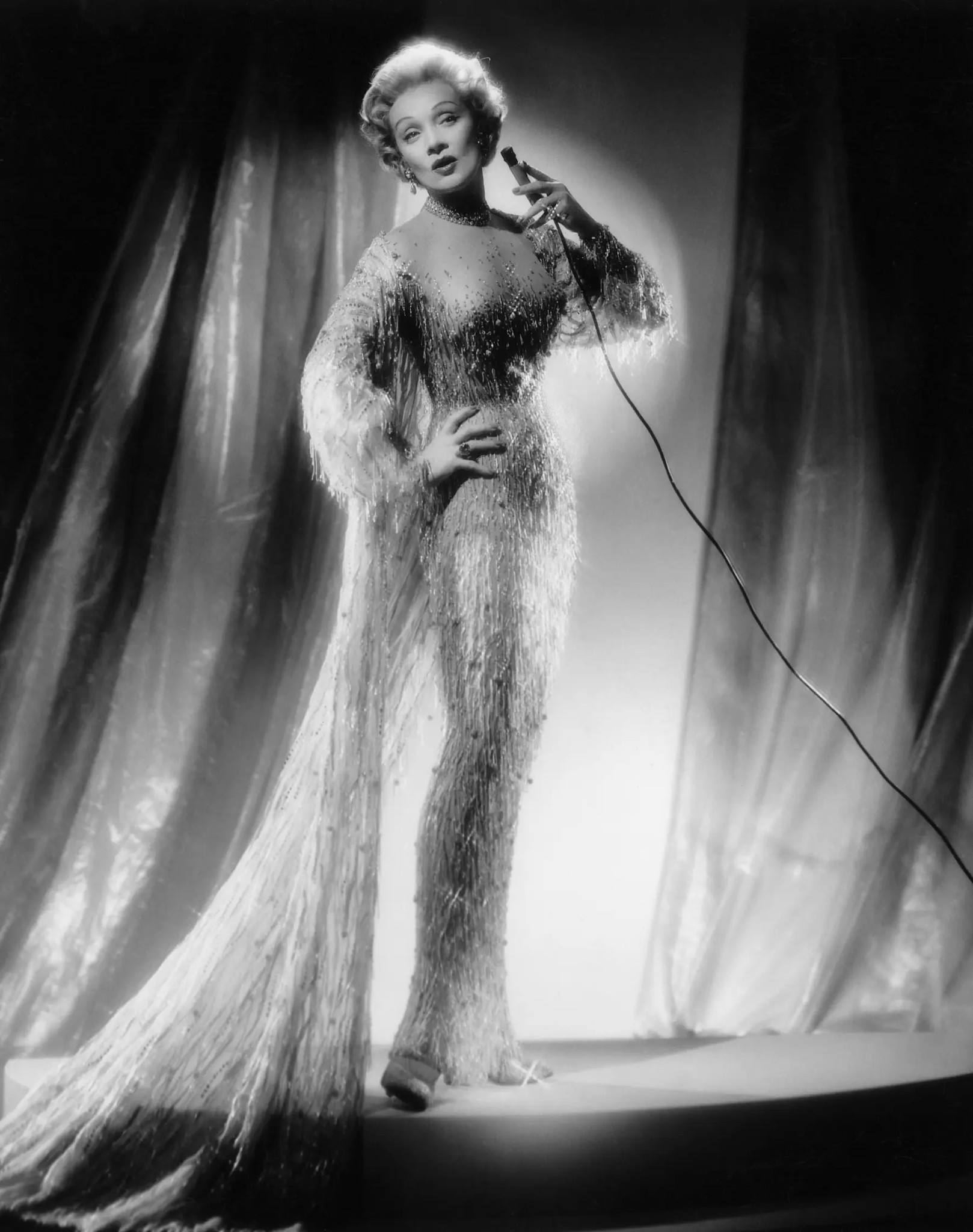 Jean Louis (1907–1997) was a legendary French-born American costume designer who became one of the most influential figures in Hollywood during the Golden Age. Born Jean Louis Berthault in Paris, he moved